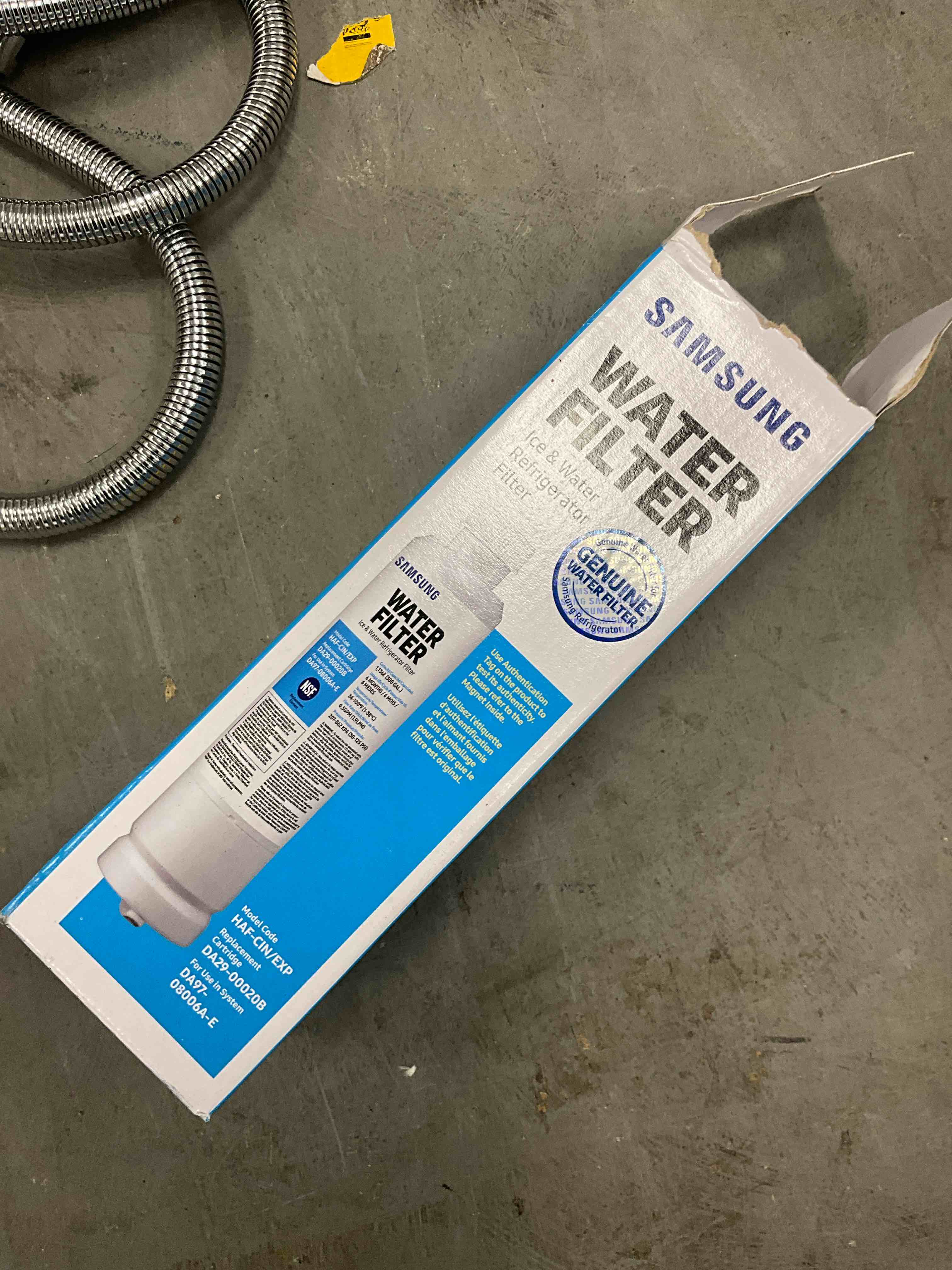 Condition photo showing As Is for water filter for select samsung refrigerators - white