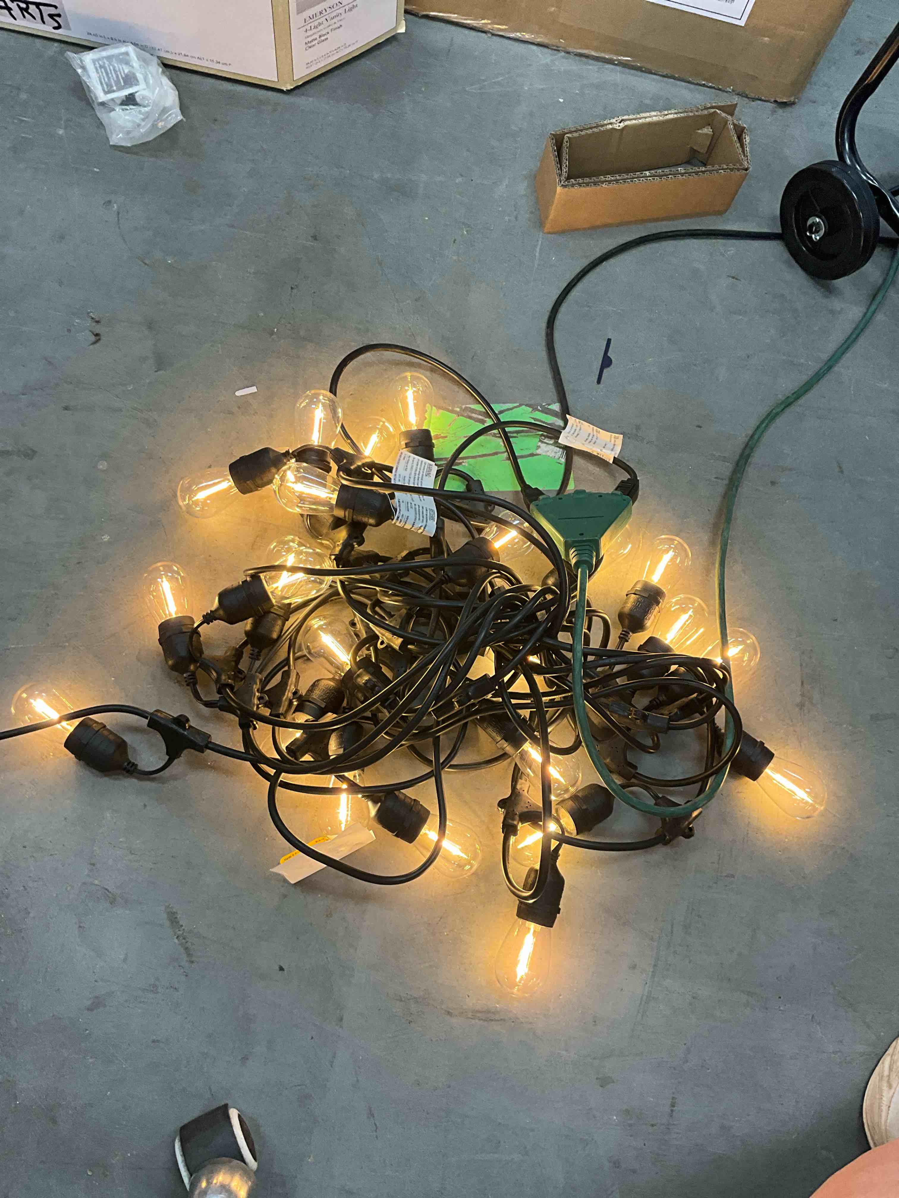 Condition photo showing Good Condition for harbor breeze 48-ft plug-in black indoor/outdoor string light with 24 white -light led edison bulbs