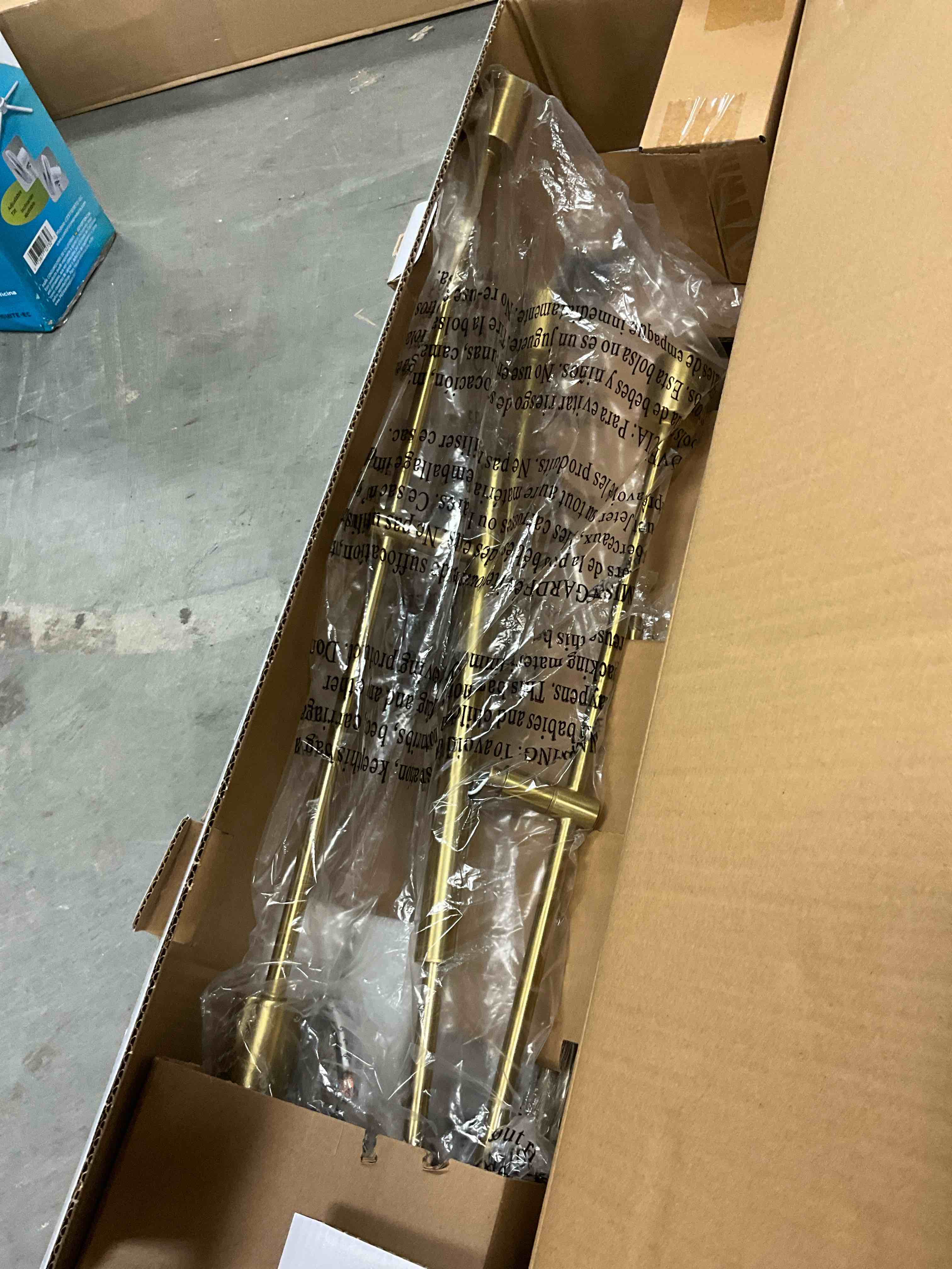 Condition photo showing As Is for origin 21 shaye 6 -light brushed gold steel chandelier