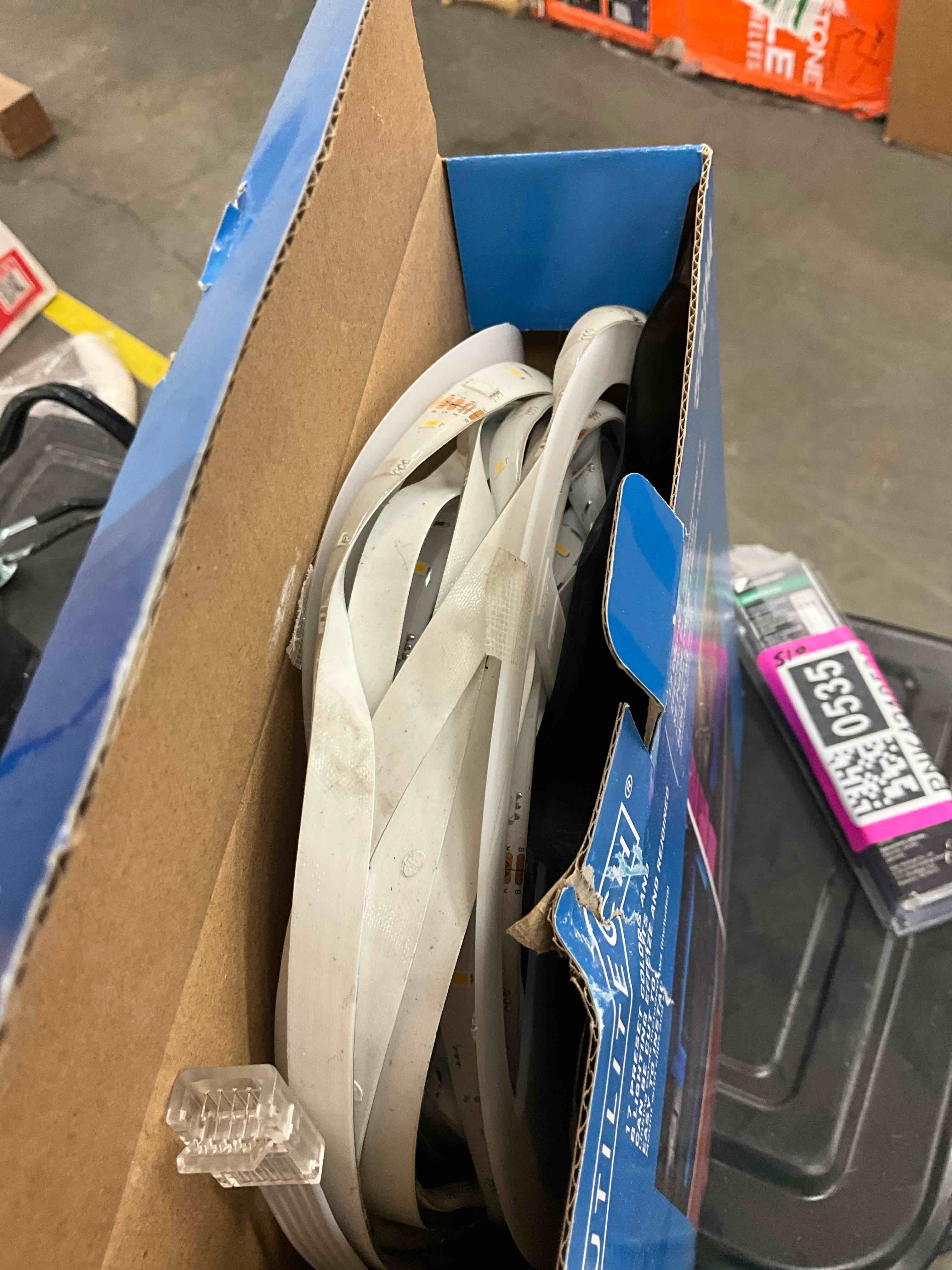 Condition photo showing As Is for utilitech indoor 32.8-ft led multicolor strip light