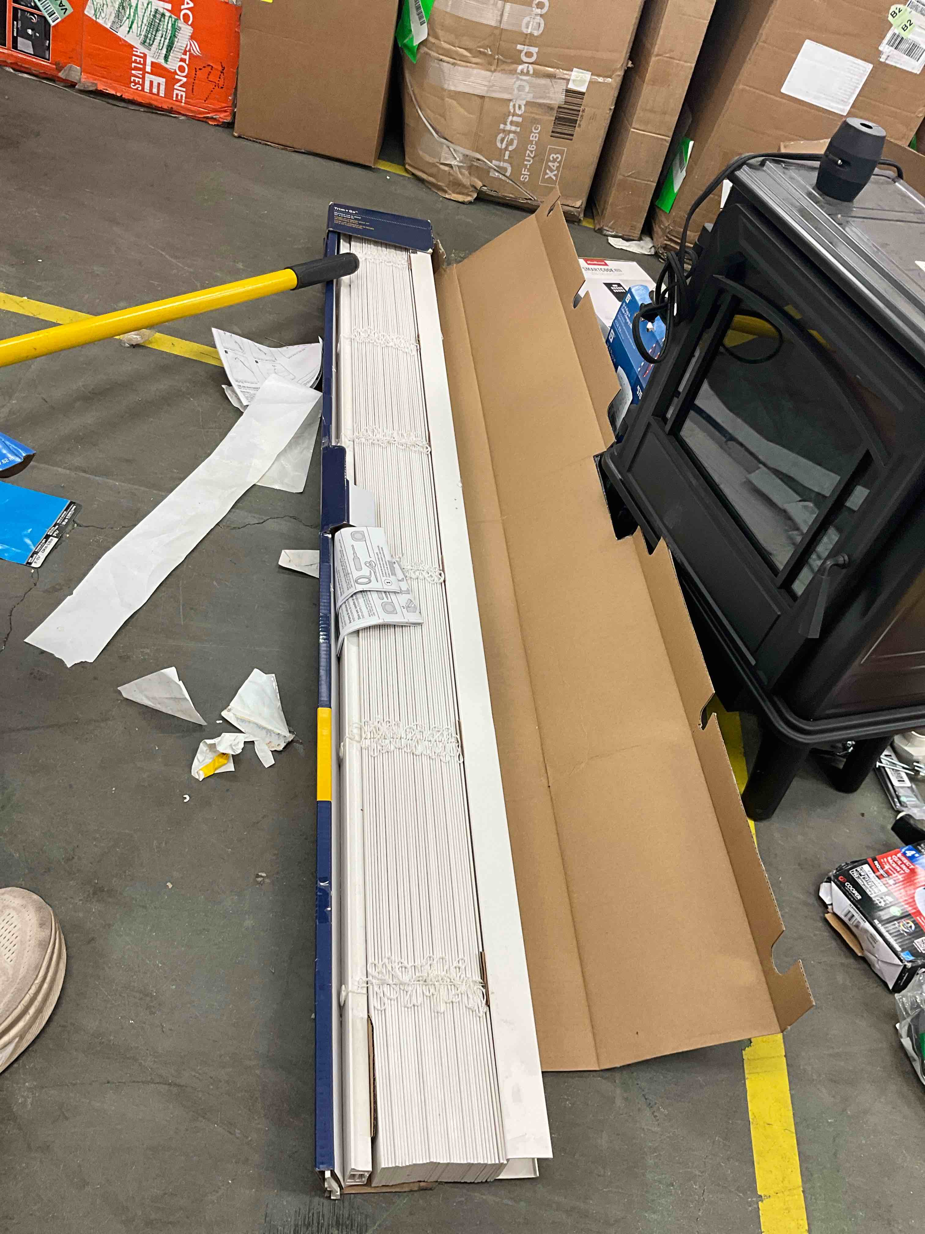 Condition photo showing Good Condition for levolor 2-in white faux wood blinds precut to 66 x 64 in. 