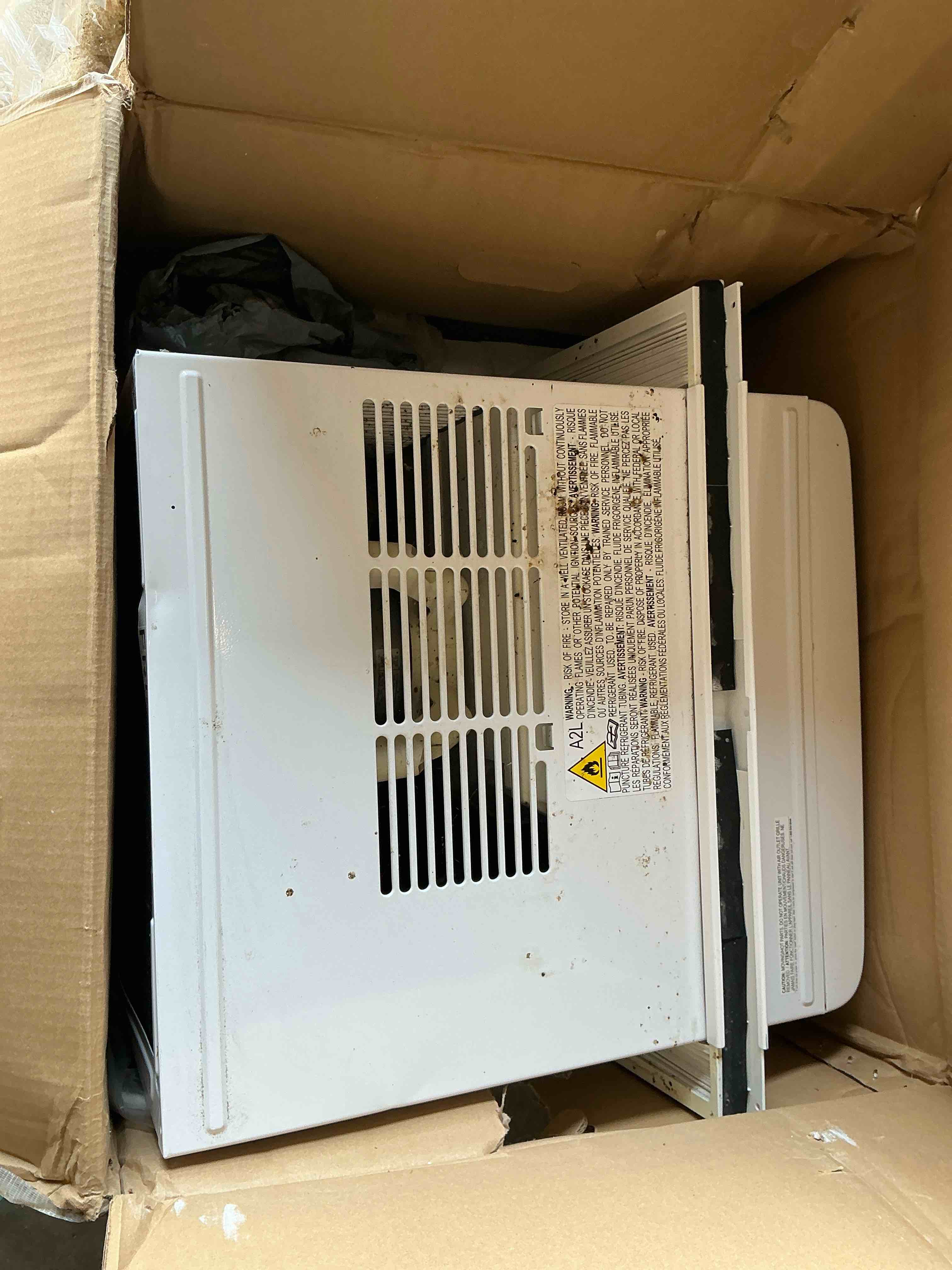 Condition photo showing As Is for frigidaire 14300 btu window air conditioner white