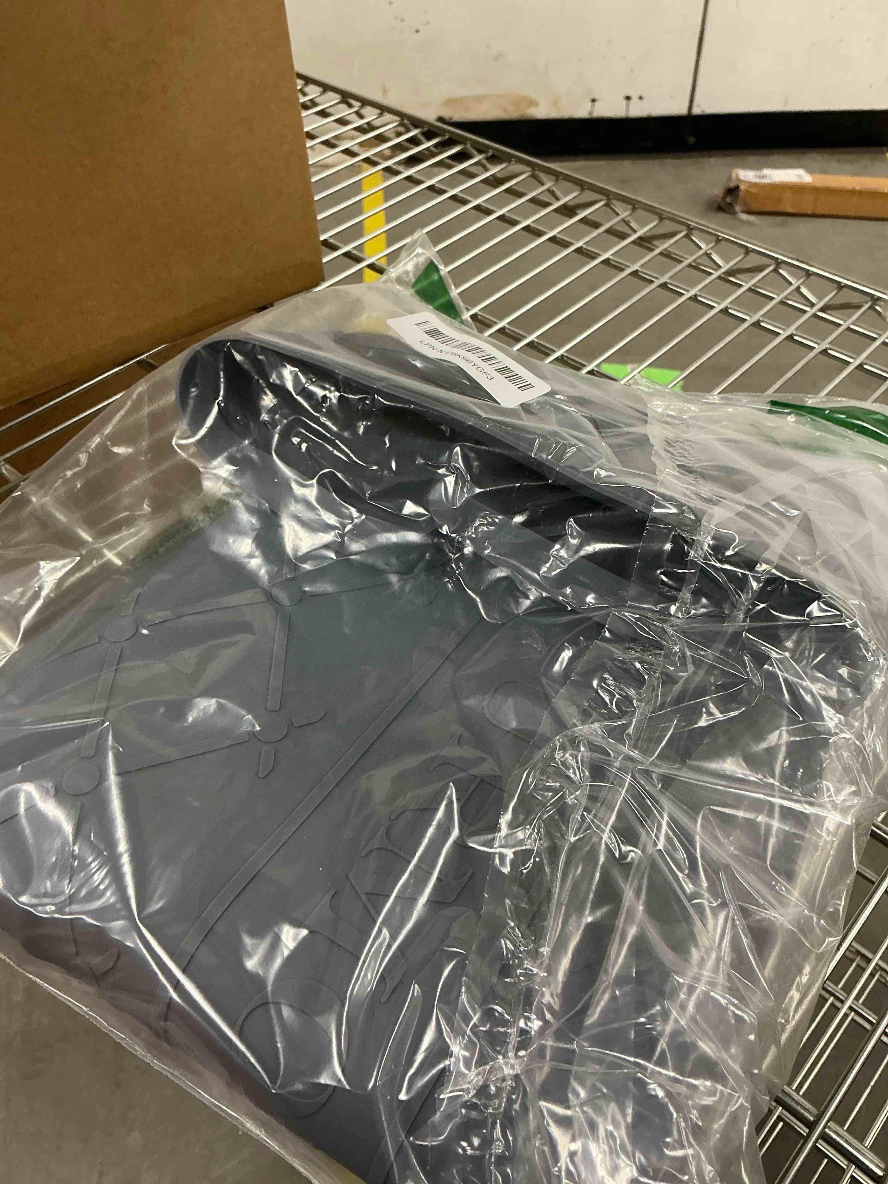 Condition photo showing Good Condition for urmona 40" x 22" waterproof silicone mat in multiple sizes & colors, under sink mat for kitchen & bathroom, pet food pad for dogs & cats, kitchen cabinet liner, multi-purpose for storage(dark grey) dark grey 22"w x 40"l