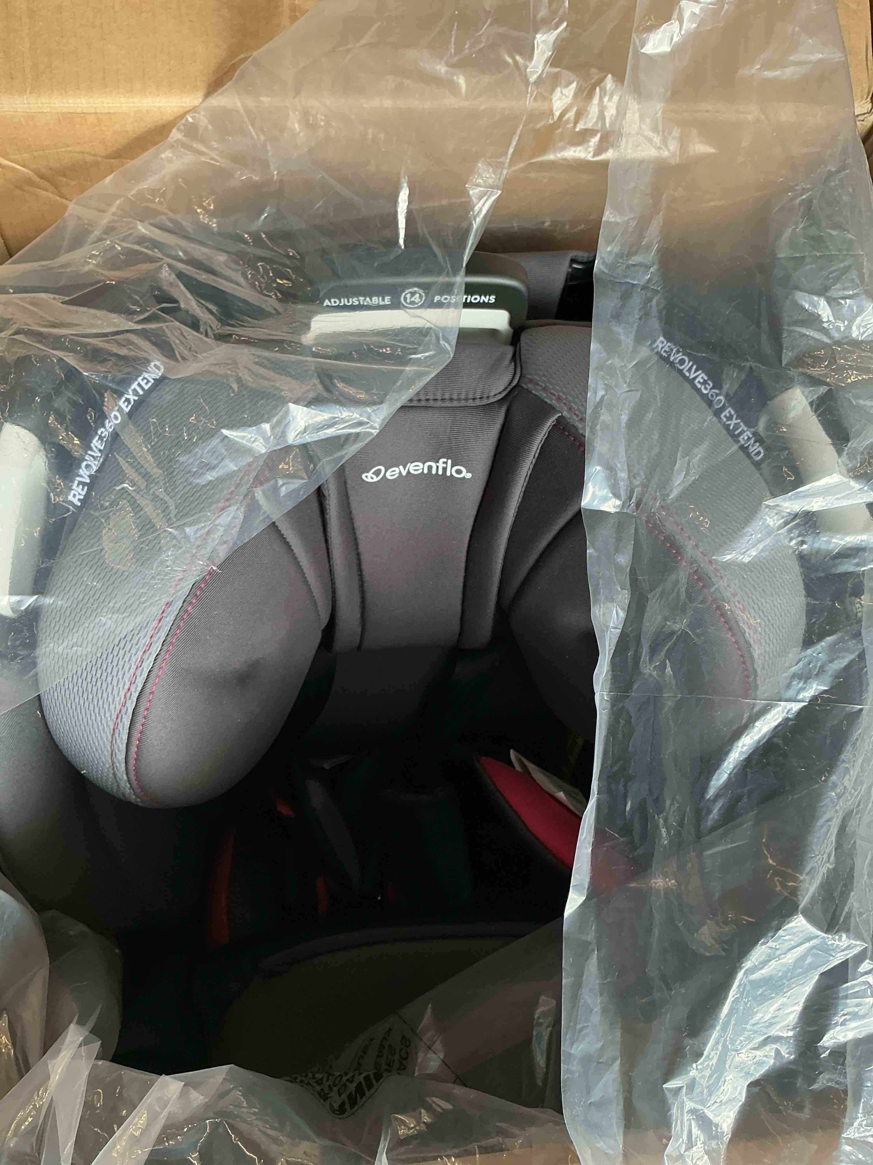 Condition photo showing New/Like New for evenflo revolve360 extend convertible car seat with 360 degree rotation, extended rear-facing, forward-facing, booster mode, and secure latch install, rowe pink