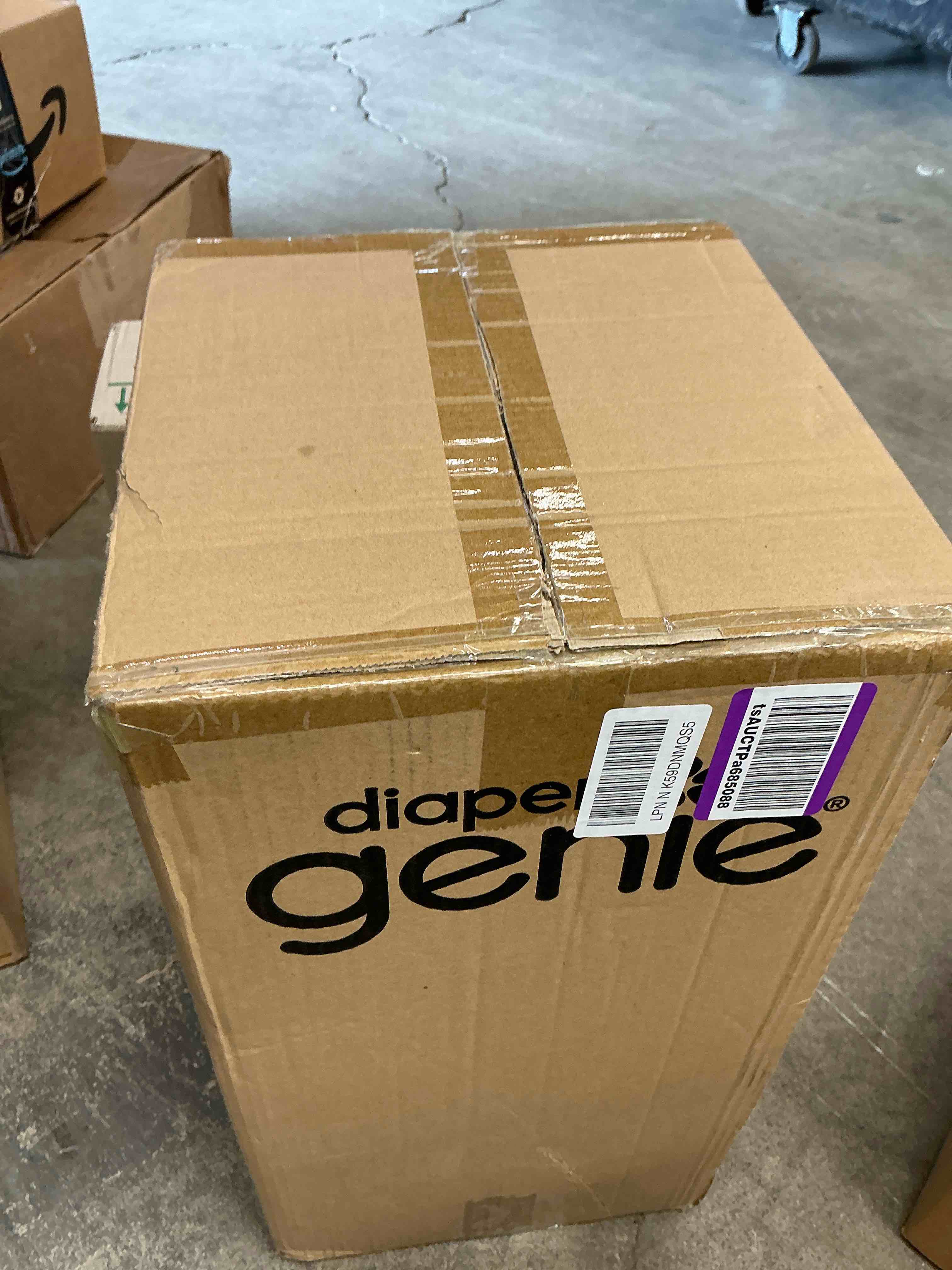 Condition photo showing New/Like New for diaper genie select pail (green) is made of durable stainless steel and includes 1 starter square refill that can hold up to 165 newborn-sized diapers.
