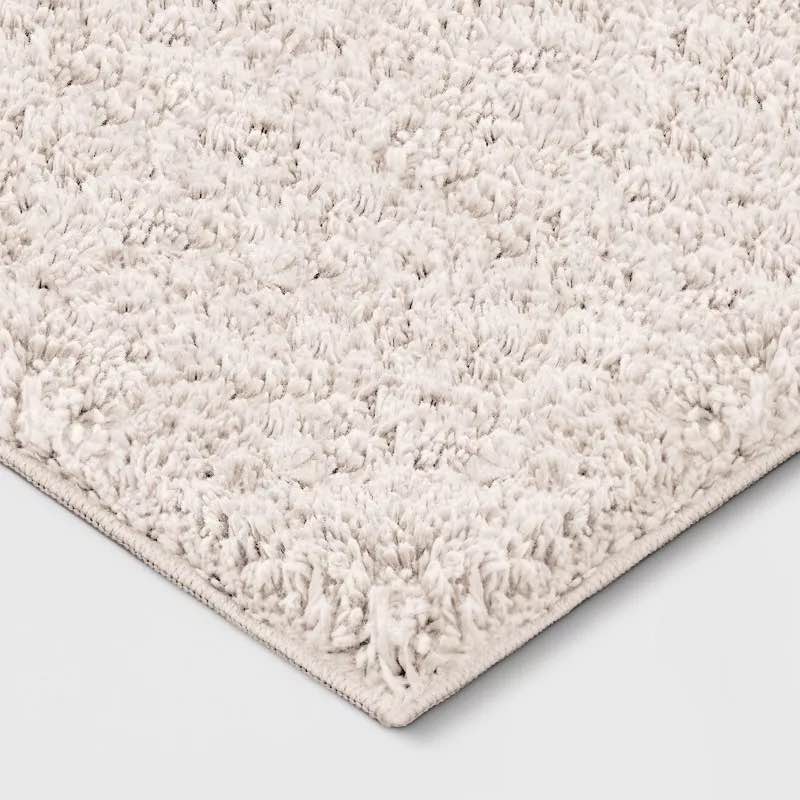 Condition photo showing Good Condition for 4'x5'6" solid shag accent rug ivory - room essentials™