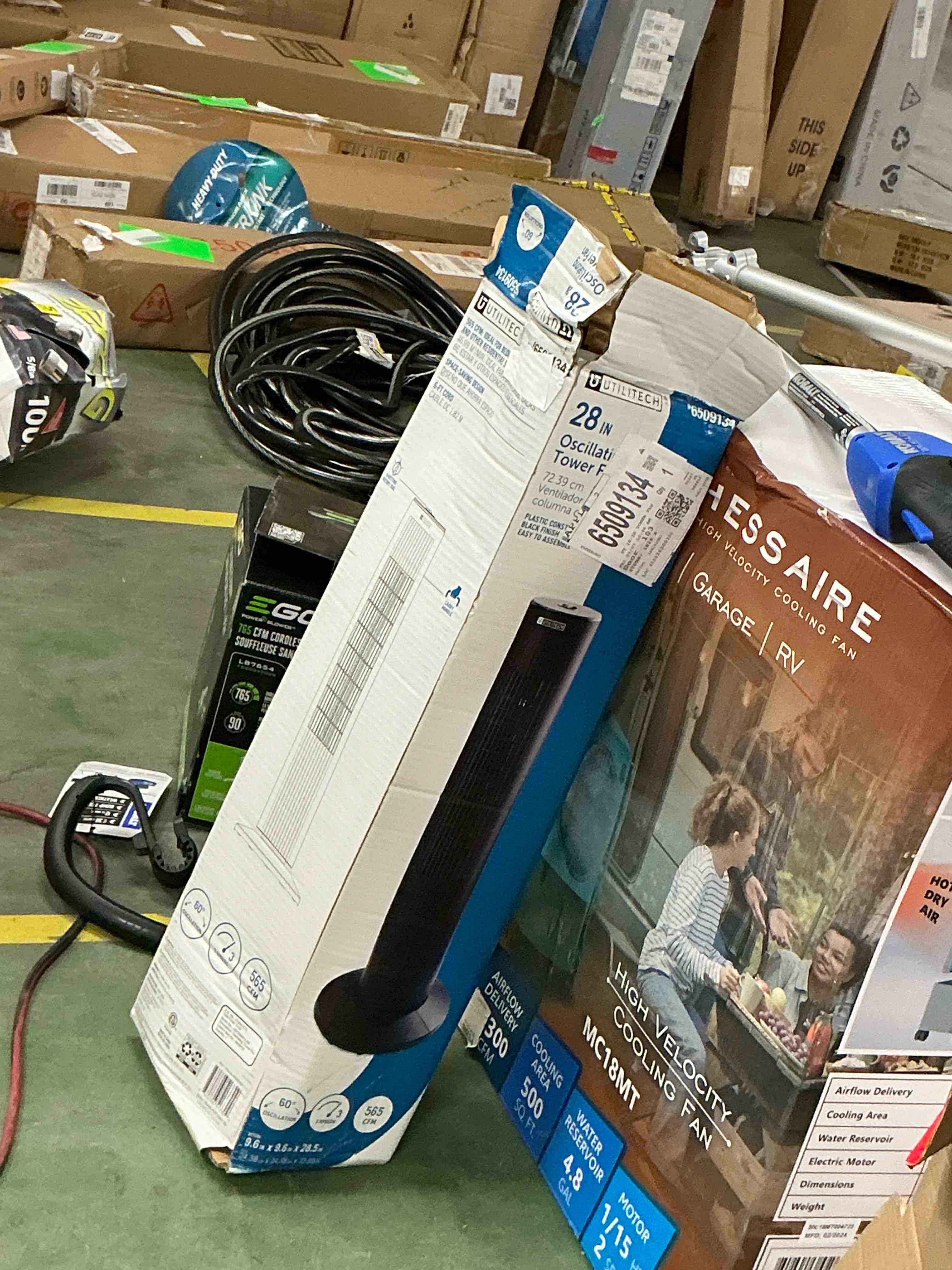 Condition photo showing As Is for utilitech 28-in indoor oscillating tower fan, in black/matte