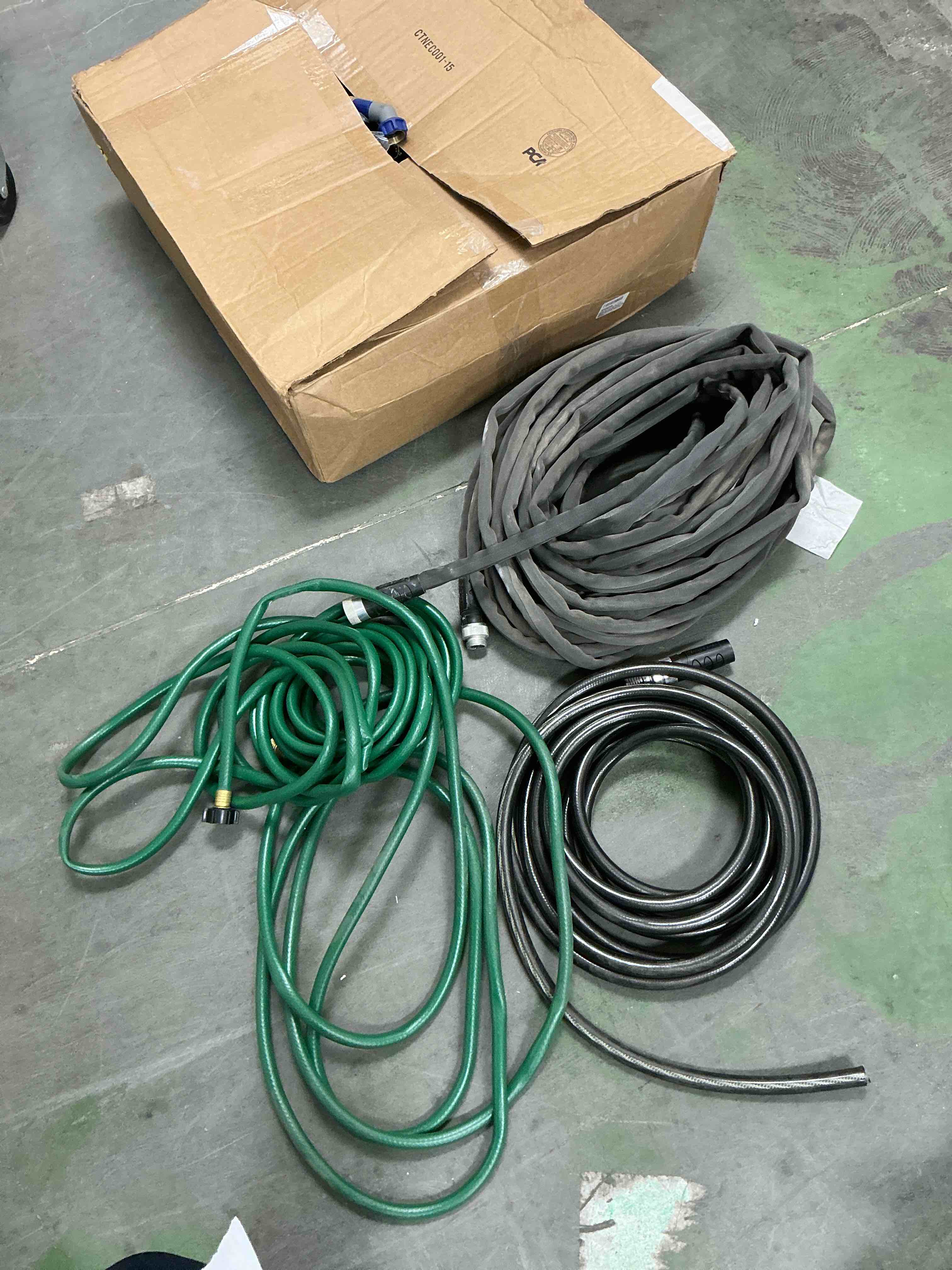 Condition photo showing As Is for 3 assorted hoses incliding zero-g teknor apex 5/8-in x 100-ft premium -duty kink free woven gray hose