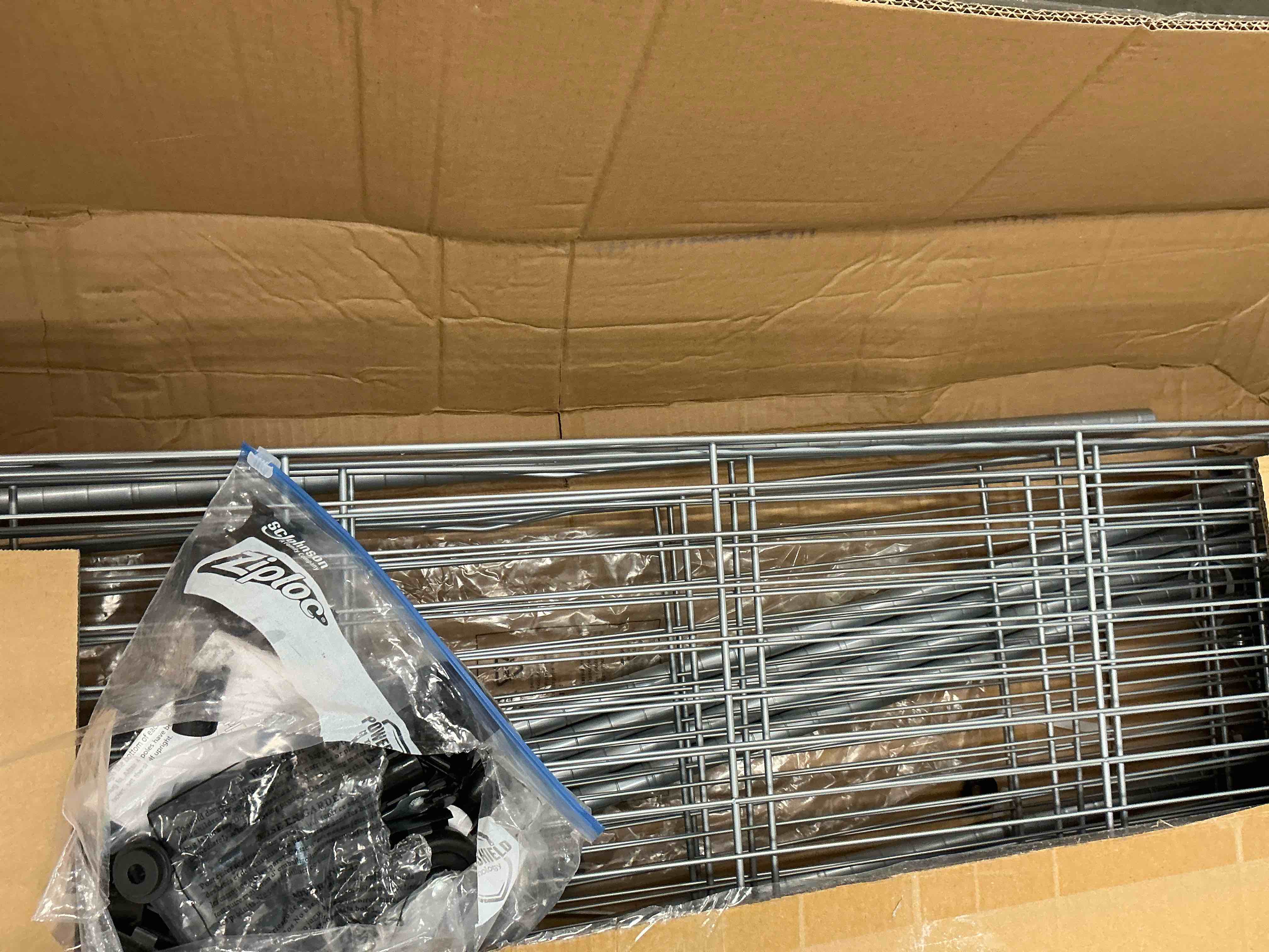 Condition photo showing Good Condition for ktaxon 6 tier wire shelving with wheels 2400lbs capacity,  heavy duty storage rack for home garage, 46"w x 18"d x 82"h adjustable shelves, silver