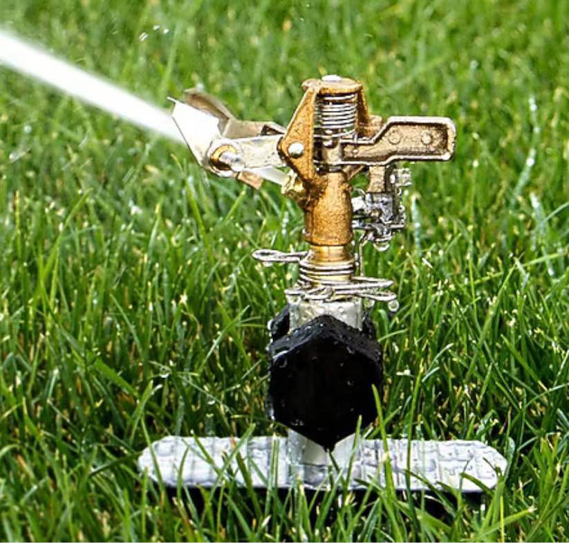 Condition photo showing Good Condition for orbit 6200-sq ft impulse spike lawn sprinkler