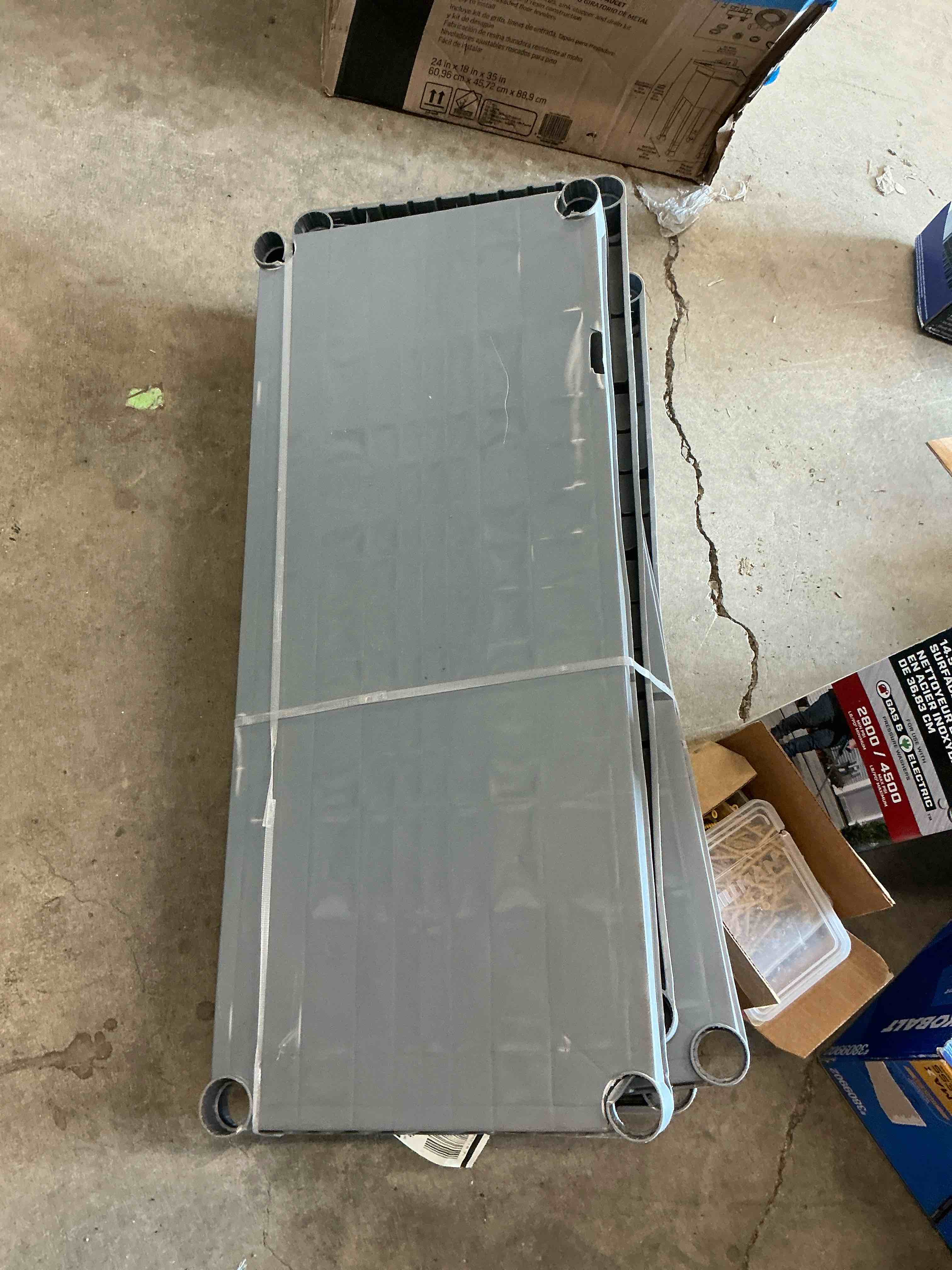 Condition photo showing As Is for project source 34.75-in w x 15.06-in d x 52.625-in h 4 -tier gray plastic utility shelving unit