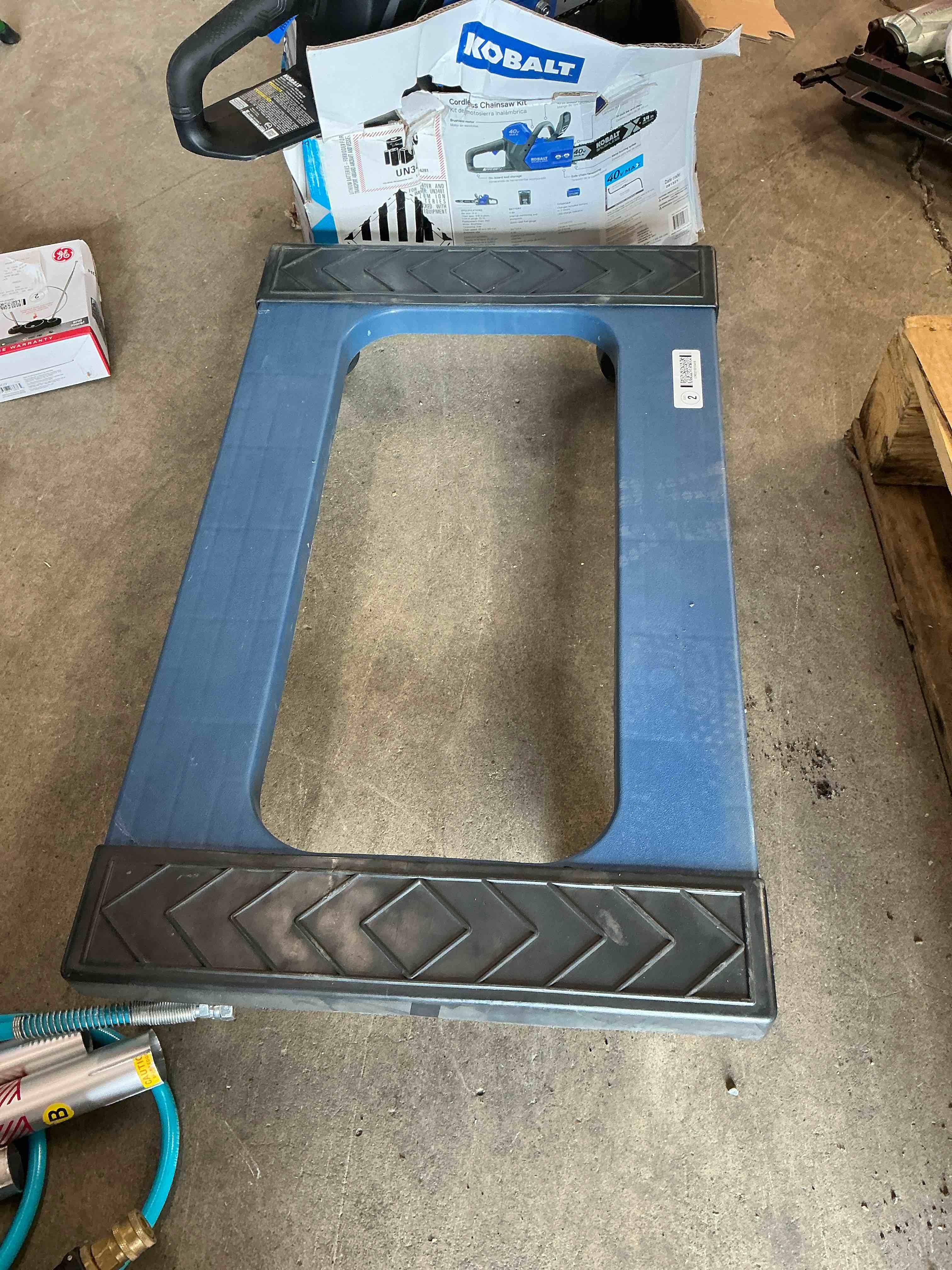 Condition photo showing Good Condition for milwaukee 1000-lb capacity 4 -wheel blue resin dolly