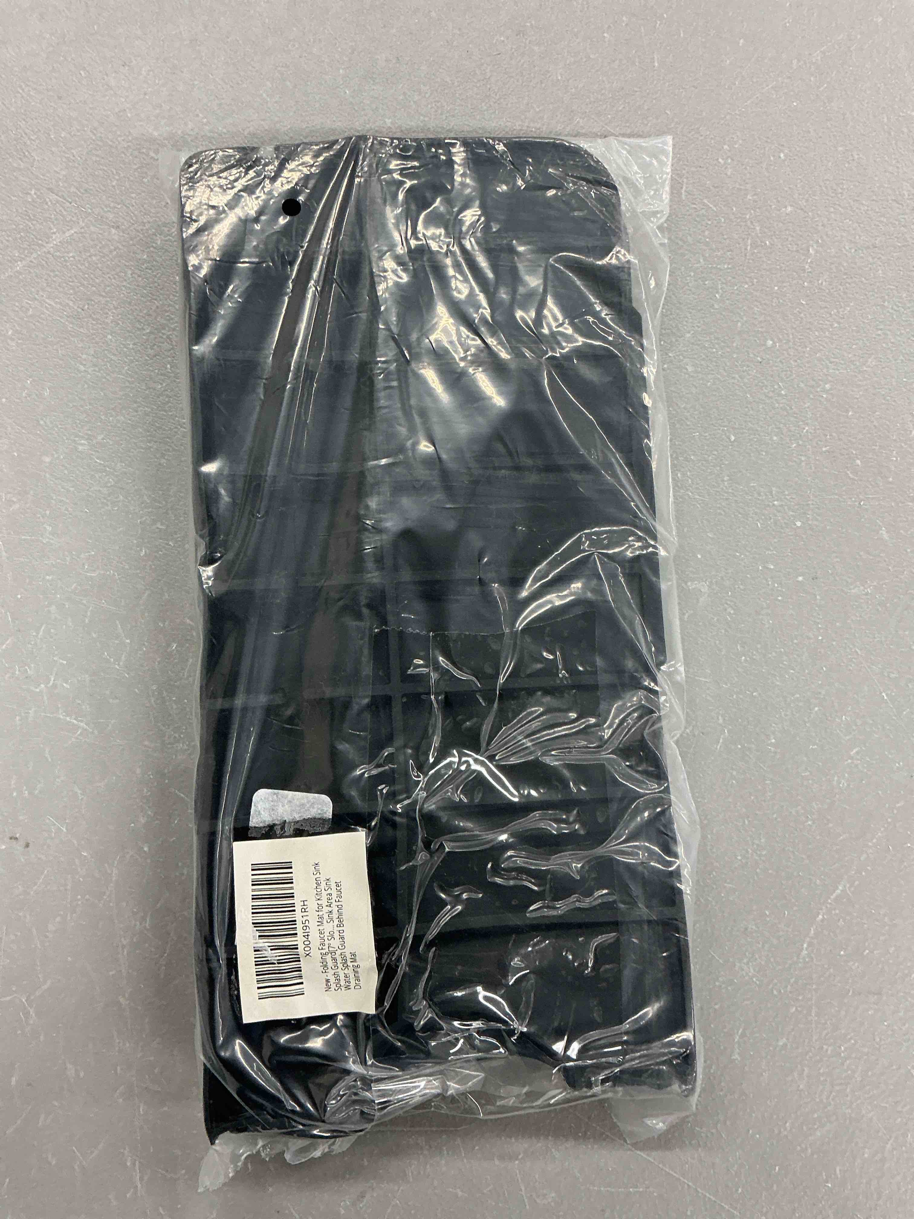 Condition photo showing Good Condition for 24'' longer faucet mat for kitchen sink splash guard[7° slope fast self-draining][snap lock fit]kitchen sink faucet mat splash guard kitchen sink area water splash guard behind faucet draining mat black 24" x 5.5"