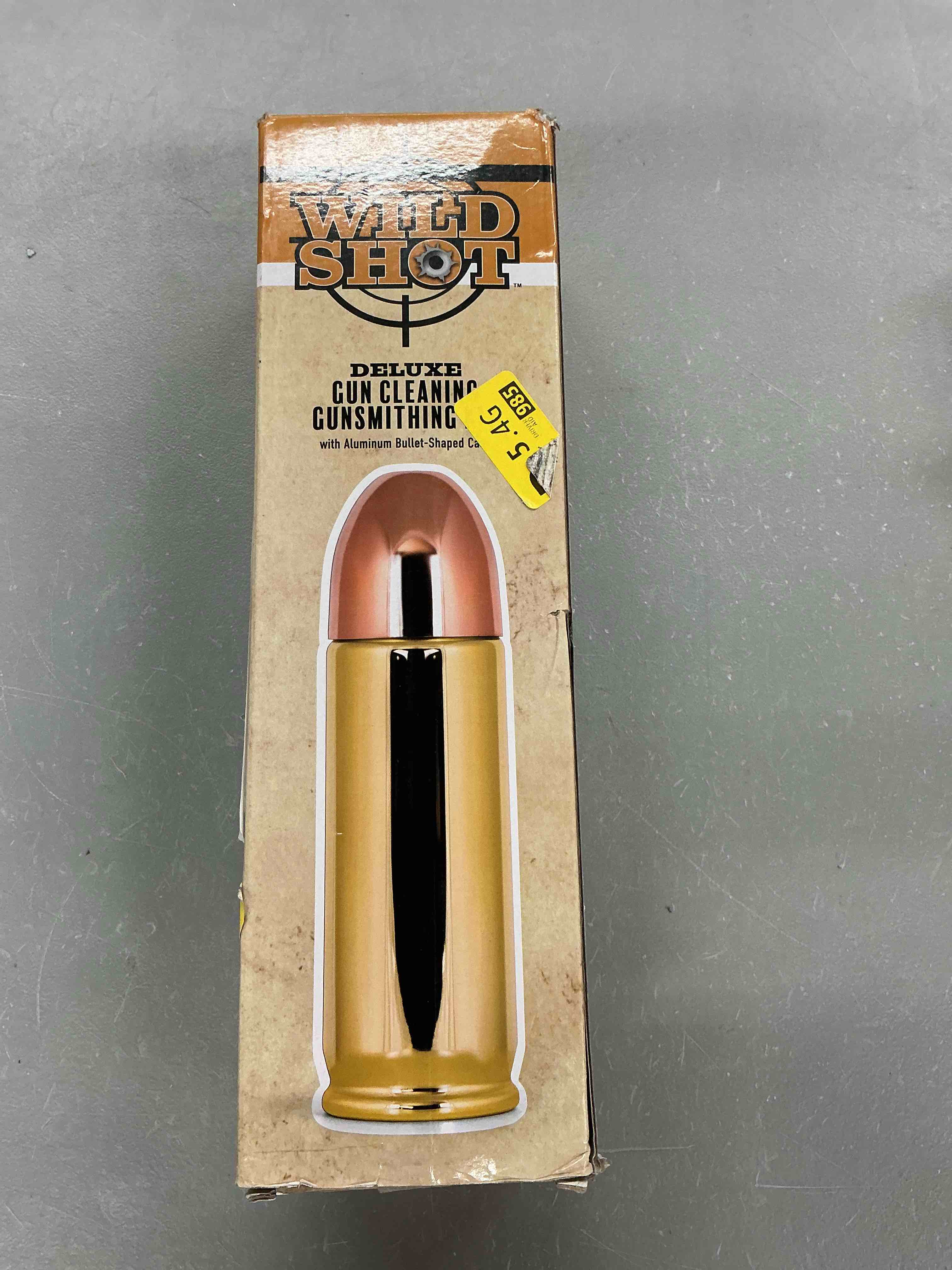 Condition photo showing Good Condition for deluxe gun cleaning/gunsmithing kit - aluminum bullet-shaped storage case, brass rods, wire brushes, mops, adaptors, slotted patch holders, patches, brush, cleaning pick, empty oil bottle