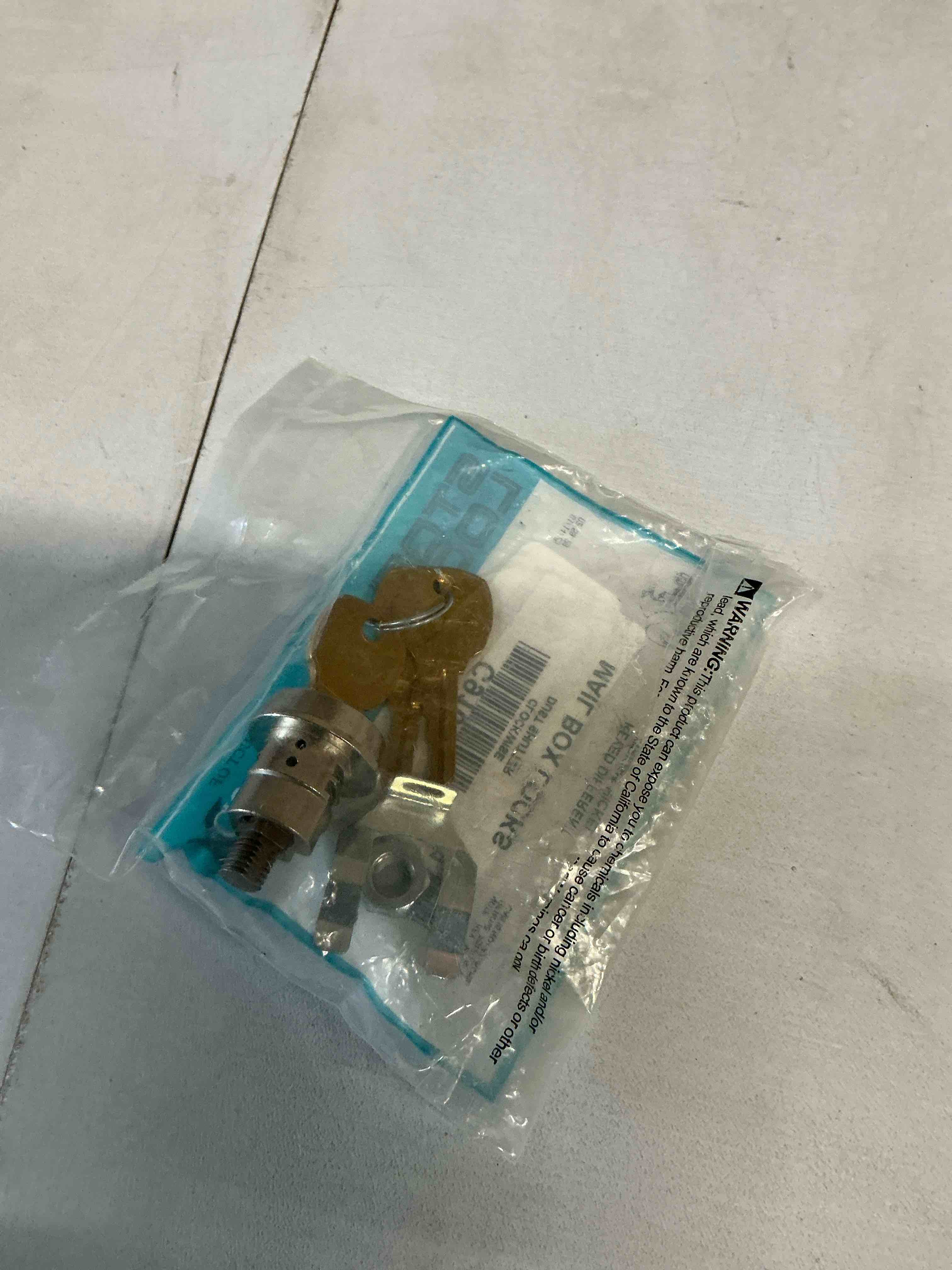 Condition photo showing Good Condition for Compx National Mailbox Lock 4C Style Clockwise