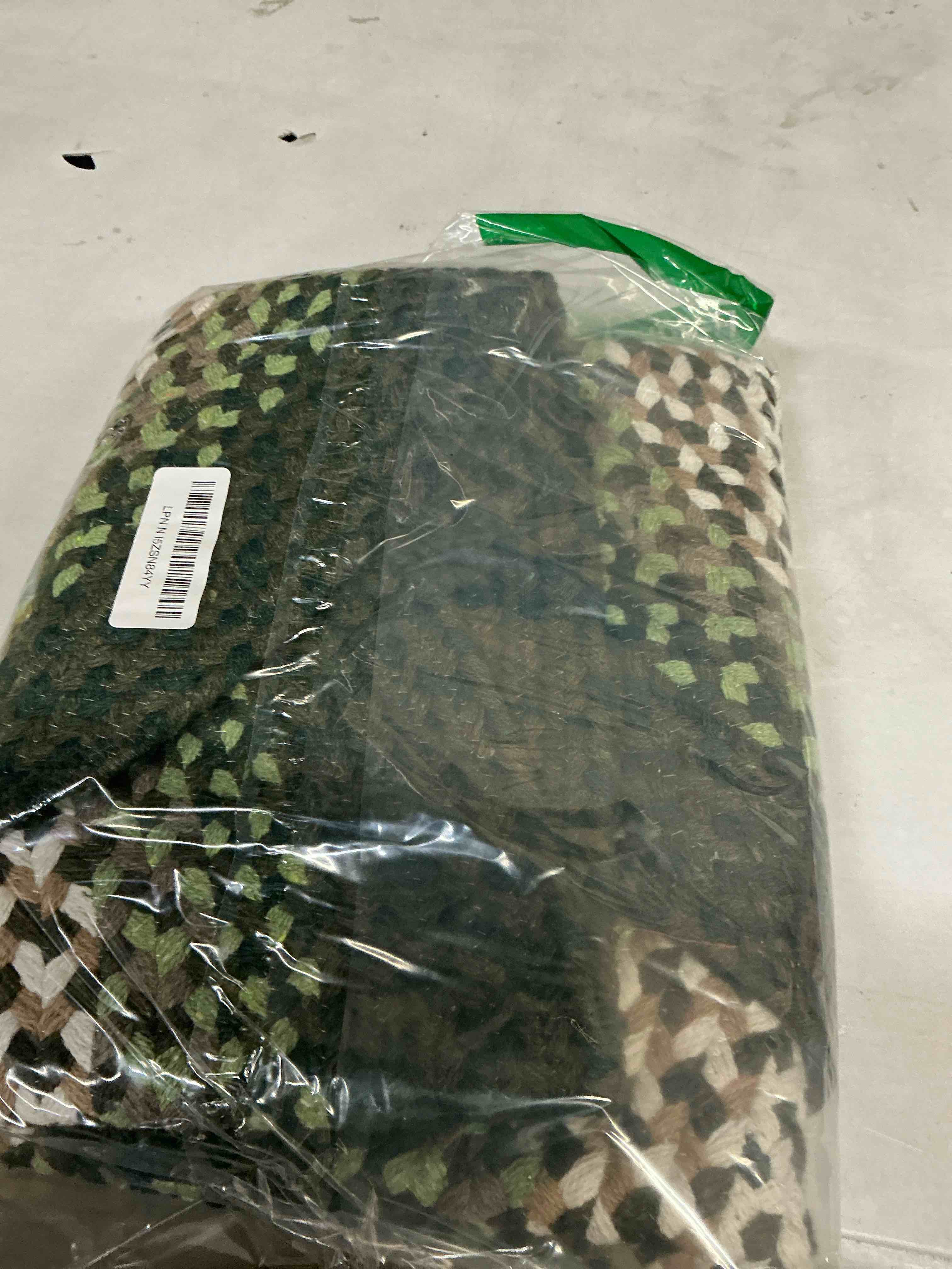 Condition photo showing Good Condition for Super Area Rugs Oval 2' X 3' Green - Ivory Oval Braided Rug for Farmhouse Style Kitchens and Bathrooms
