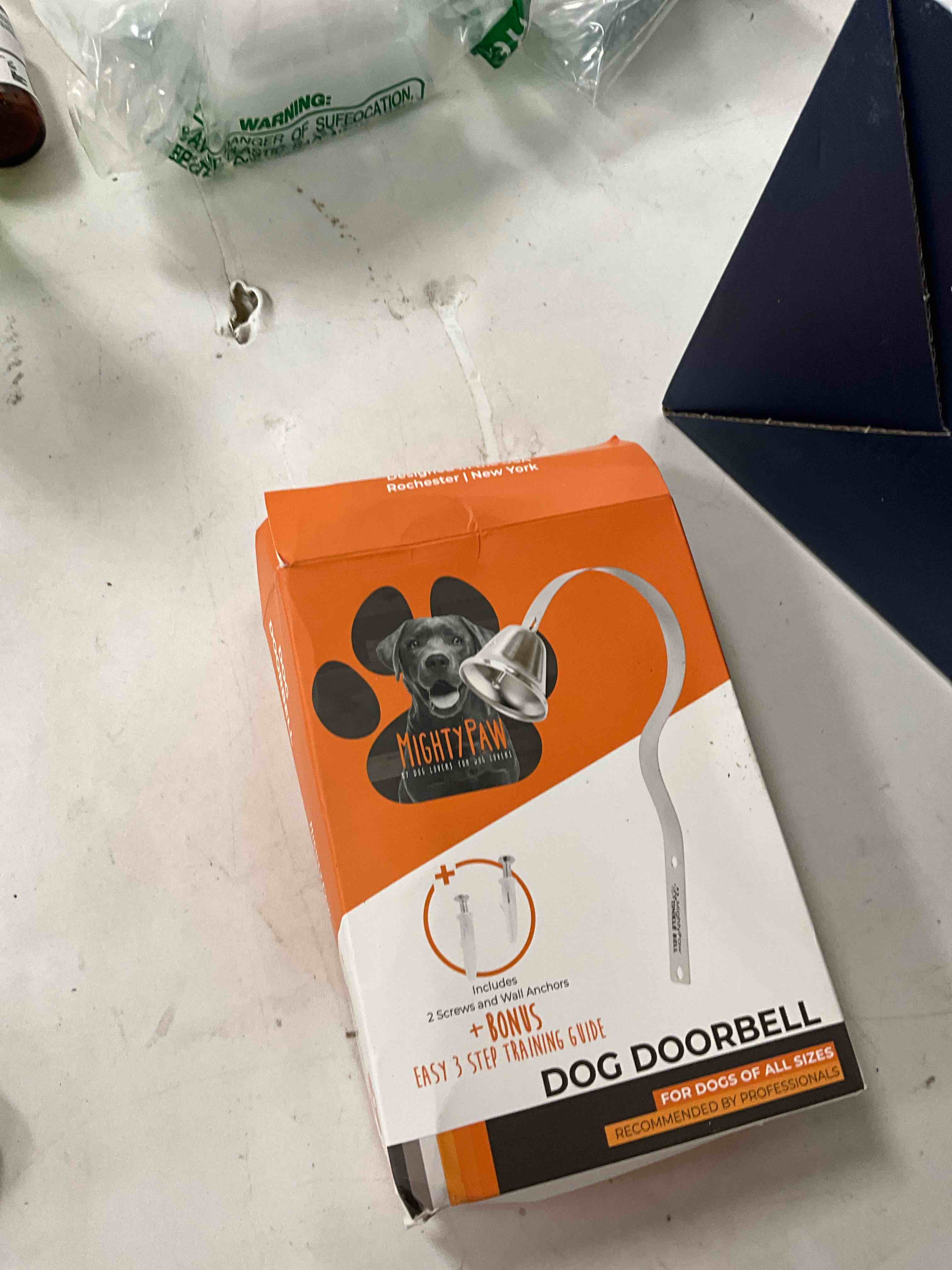 Condition photo showing Good Condition for Mighty Paw Metal Dog Doorbell - Durable Bell Big Dog - Optimized Sound - Includes Doggy Doorbell Training Tips - Durable Sleek Silver Bell - Puppy Supplies - Pet Potty Training