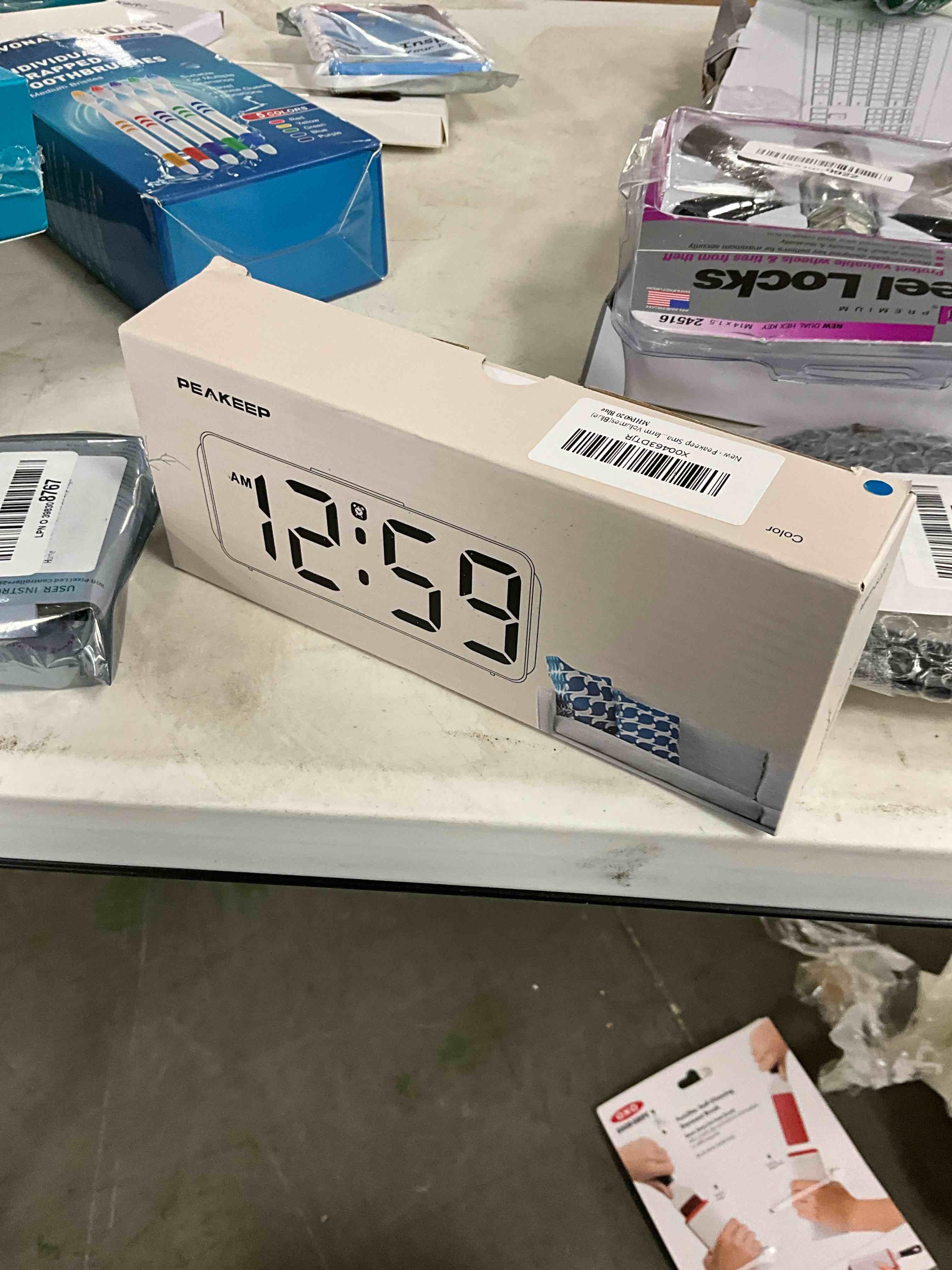 Condition photo showing Good Condition for Peakeep Small Digital Alarm Clock Plug in for Bedrooms Bedside, Tiny Electric Clock Large Big Numbers Display with Battery Backup for Desk Table, 6 Dimmers, 5 Adjustable Alarm Volumes (Blue)