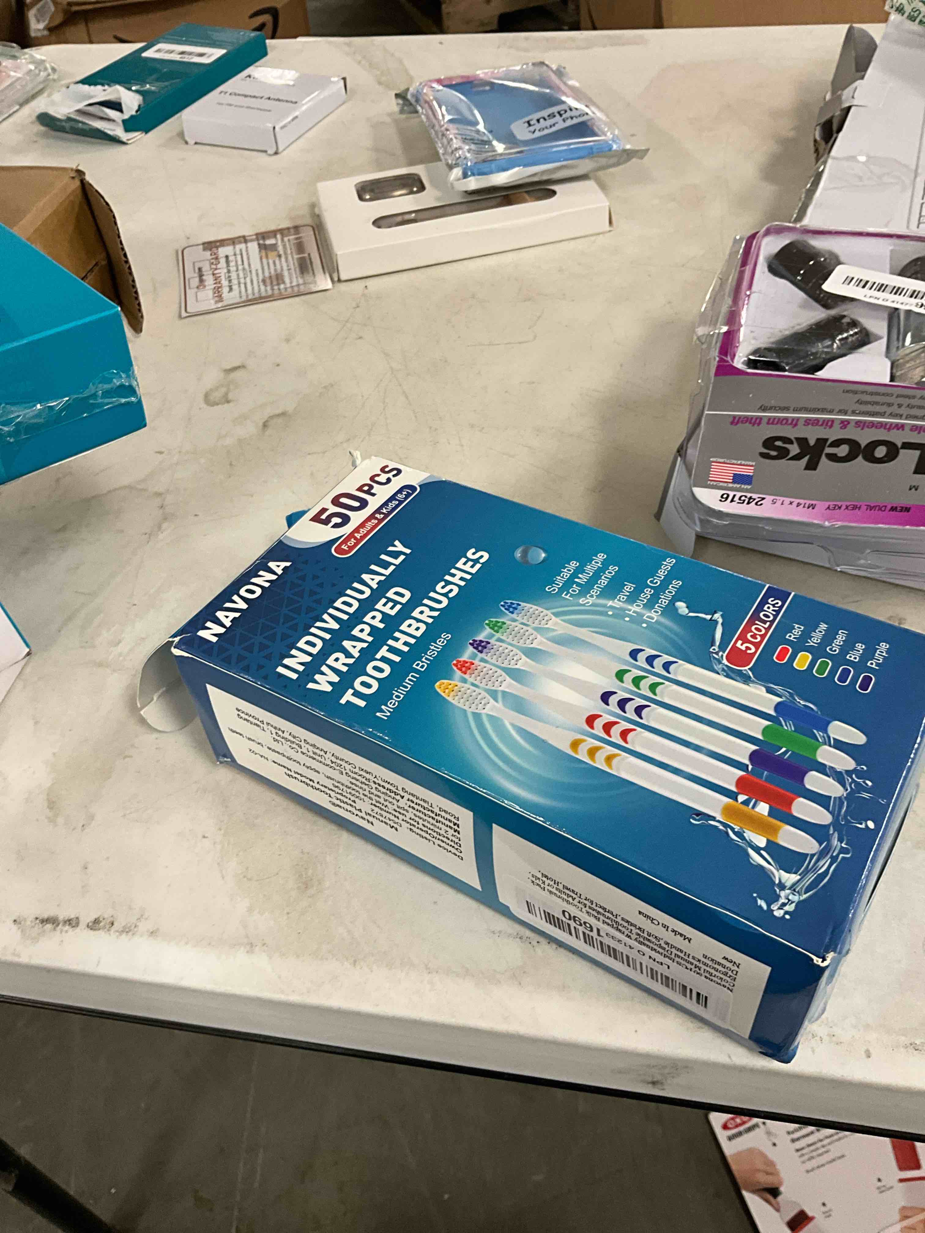 Condition photo showing Good Condition for Navona 50 PCS Premium Individually Wrapped Bulk Toothbrush Pack, Disposable Toothbrushes, Kids Toothbrush, Medium Soft Bristle Toothbrushes, Ergonomics Handle, Perfect for Travel Hotel Donation