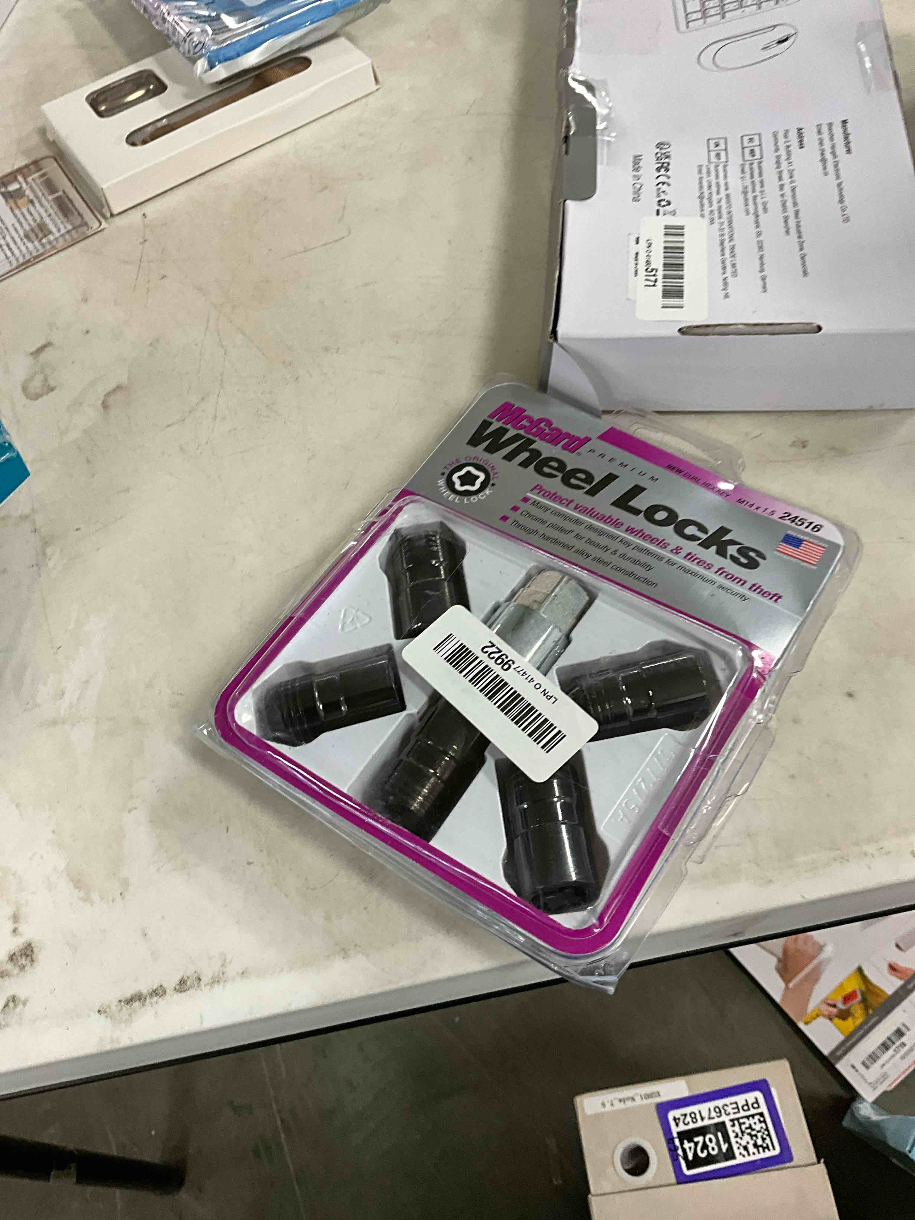 Condition photo showing New/Like New for McGard 24216 Black Cone Seat Wheel Locks (M14X1.5 Thread Size) - Set of 4 w/Key