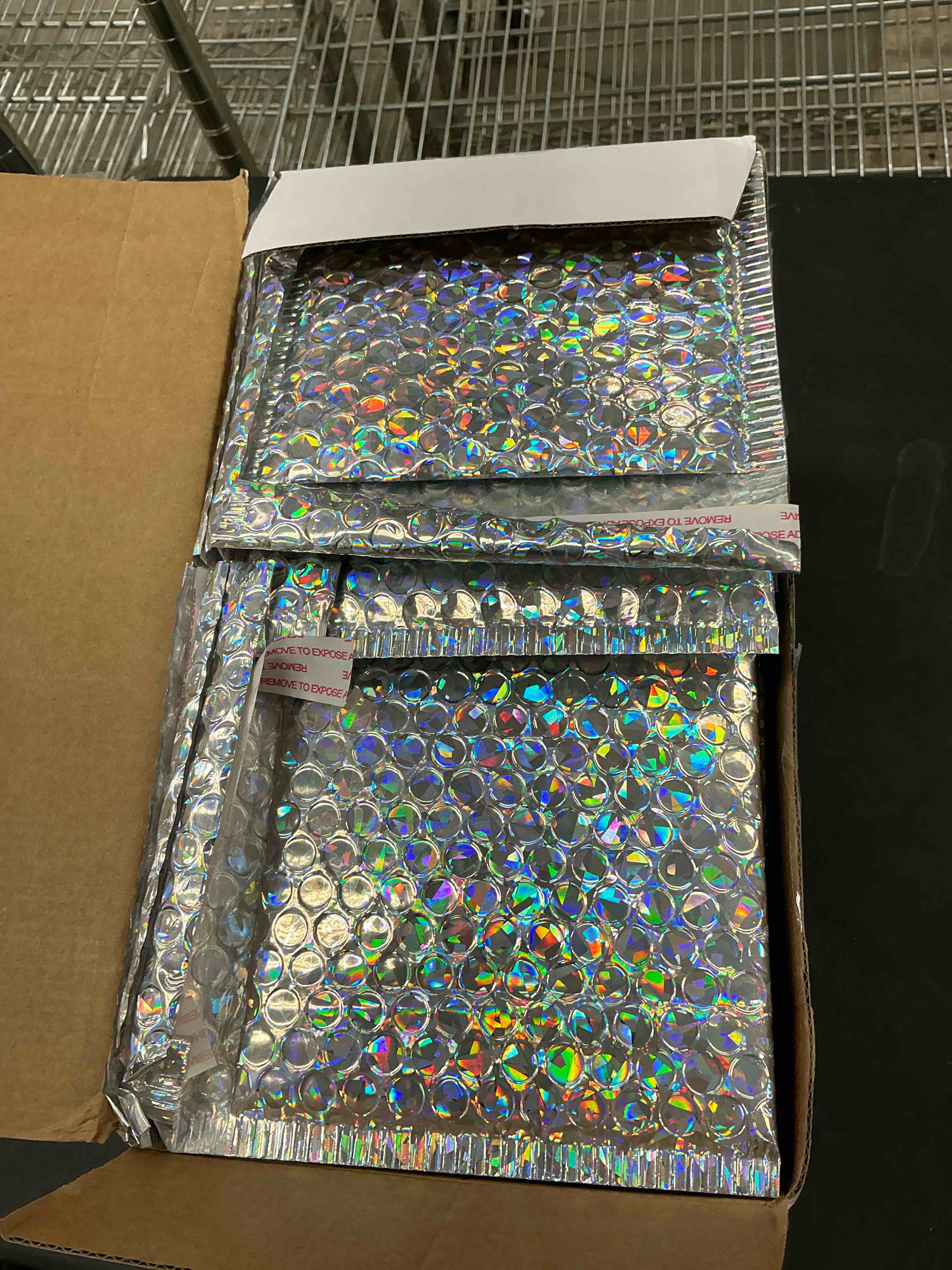 Condition photo showing Good Condition for 50 Pieces Bubble Mailers 3 Sizes Self Seal Adhesive Poly Mailers Metallic Foil Glitter Padded Shipping Bubble Envelopes for Valentine Mailing Packing Small Business(Glitter Silver)