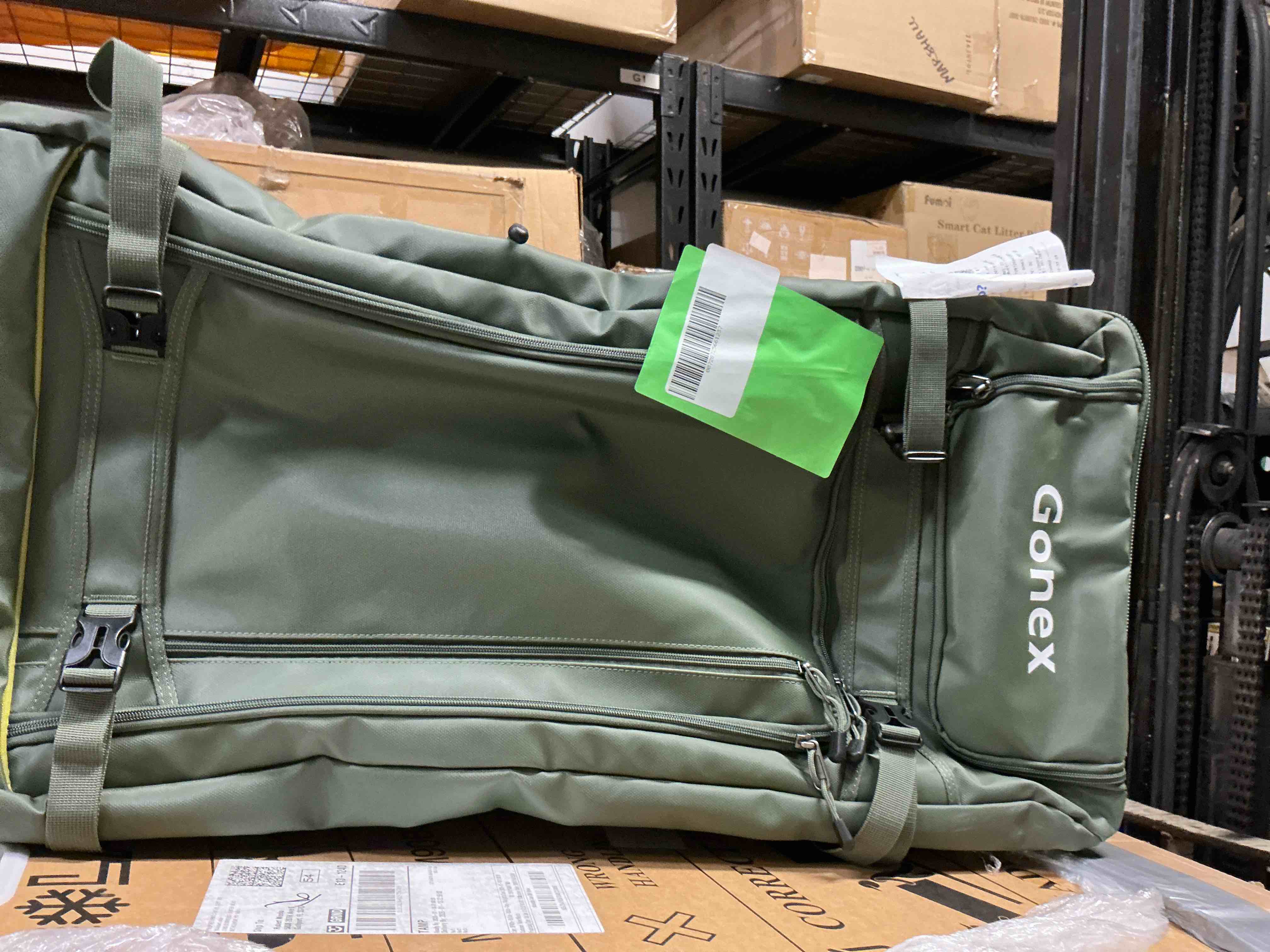 Condition photo showing Good Condition for Gonex 33  Rolling Duffle Bag with Wheels  100L Water Repellent Large Travel Duffel Luggage