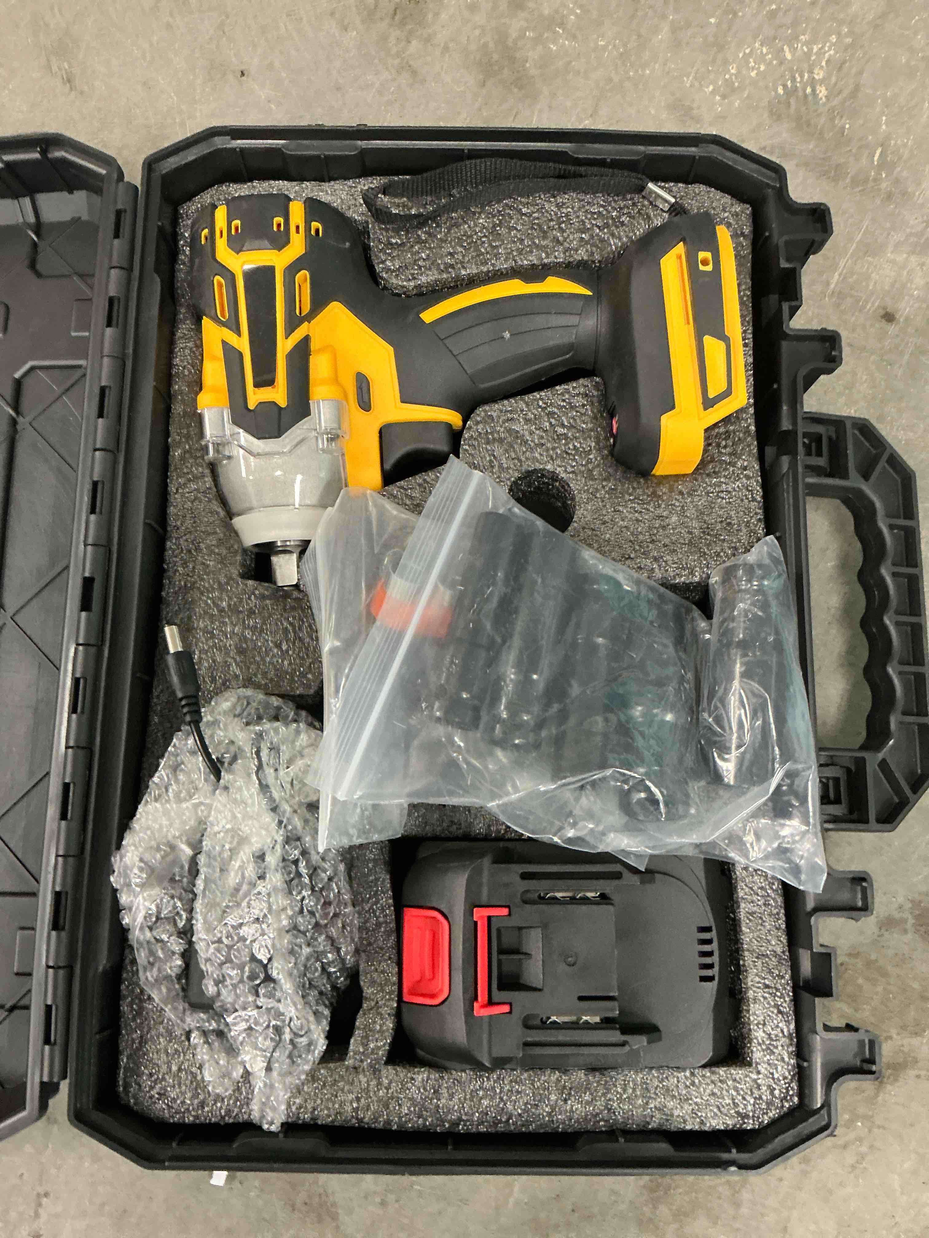 Condition photo showing New/Like New for Gijjgole Cordless Impact Wrench, (300N.m) Brushless 1/2 inch Impact Gun, 3000RPM High Torque Impact Gun with 6.0 Ah Battery, Charger, 5 Sockets, Electric Impact Wrench for Car Home