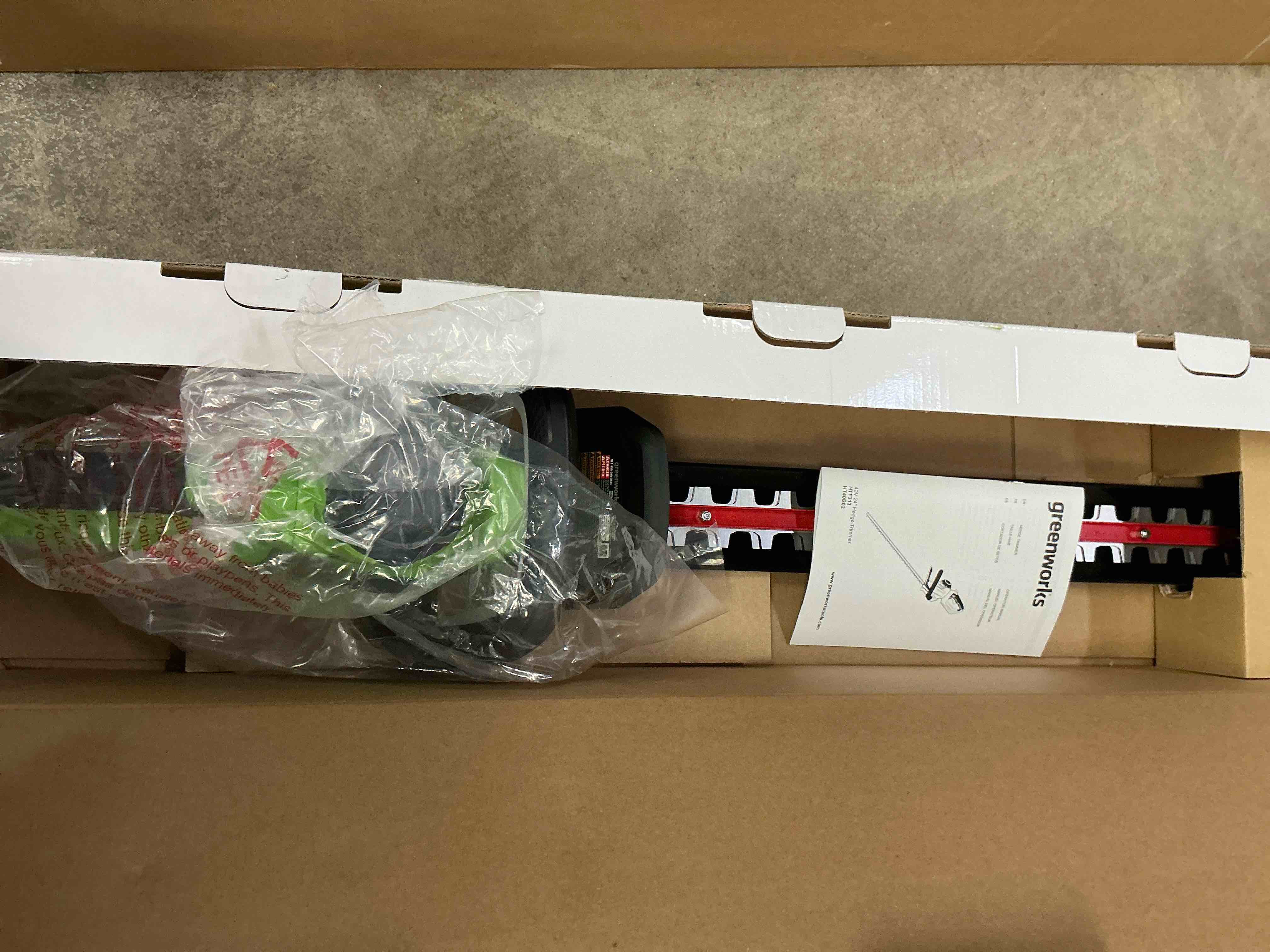 Condition photo showing New/Like New for Greenworks - 24 in. 40-Volt Hedge Trimmer (Battery and Charger Not Included) - Black/Green