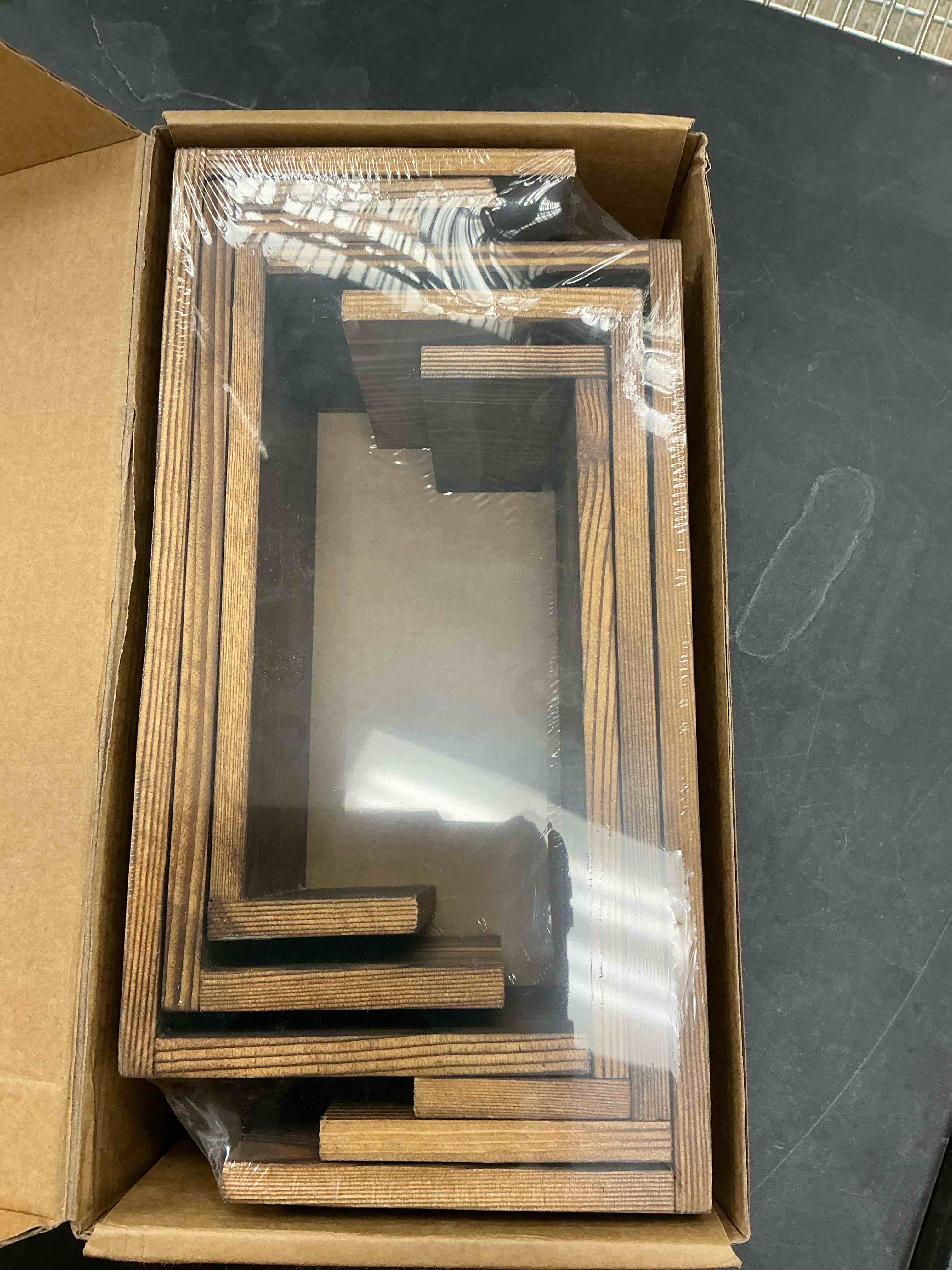 Condition photo showing New/Like New for 3-Tier Wood Display Riser 2 Set, Tiered Display Stand for Food, Kitchen, Desk & Party - Solid Pine Wooden Shelf & Organizer for Plants, Collectibles, Office (9.5/8.5/7.5 In) Carbonized