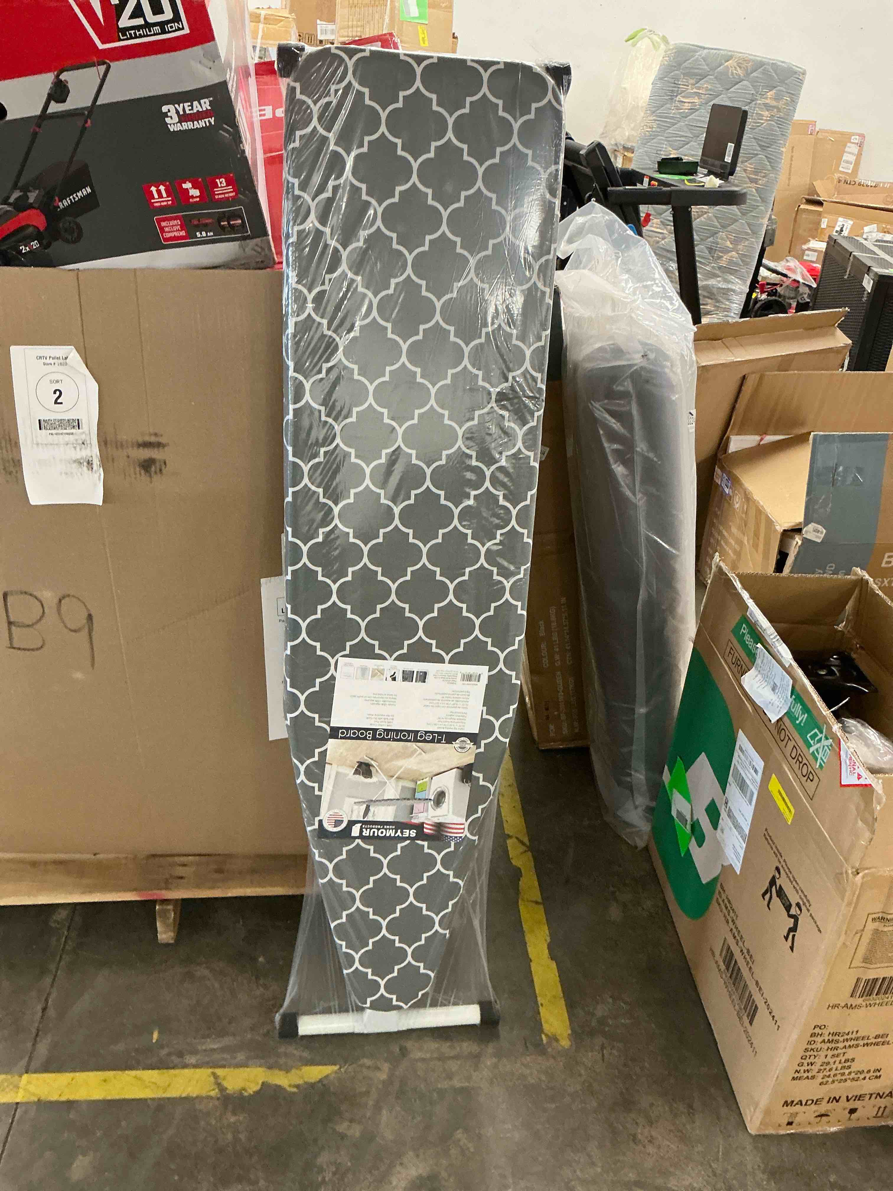 Condition photo showing New/Like New for seymour home products adjustable height ironing board, t-leg frame, 53" x 14", lattice