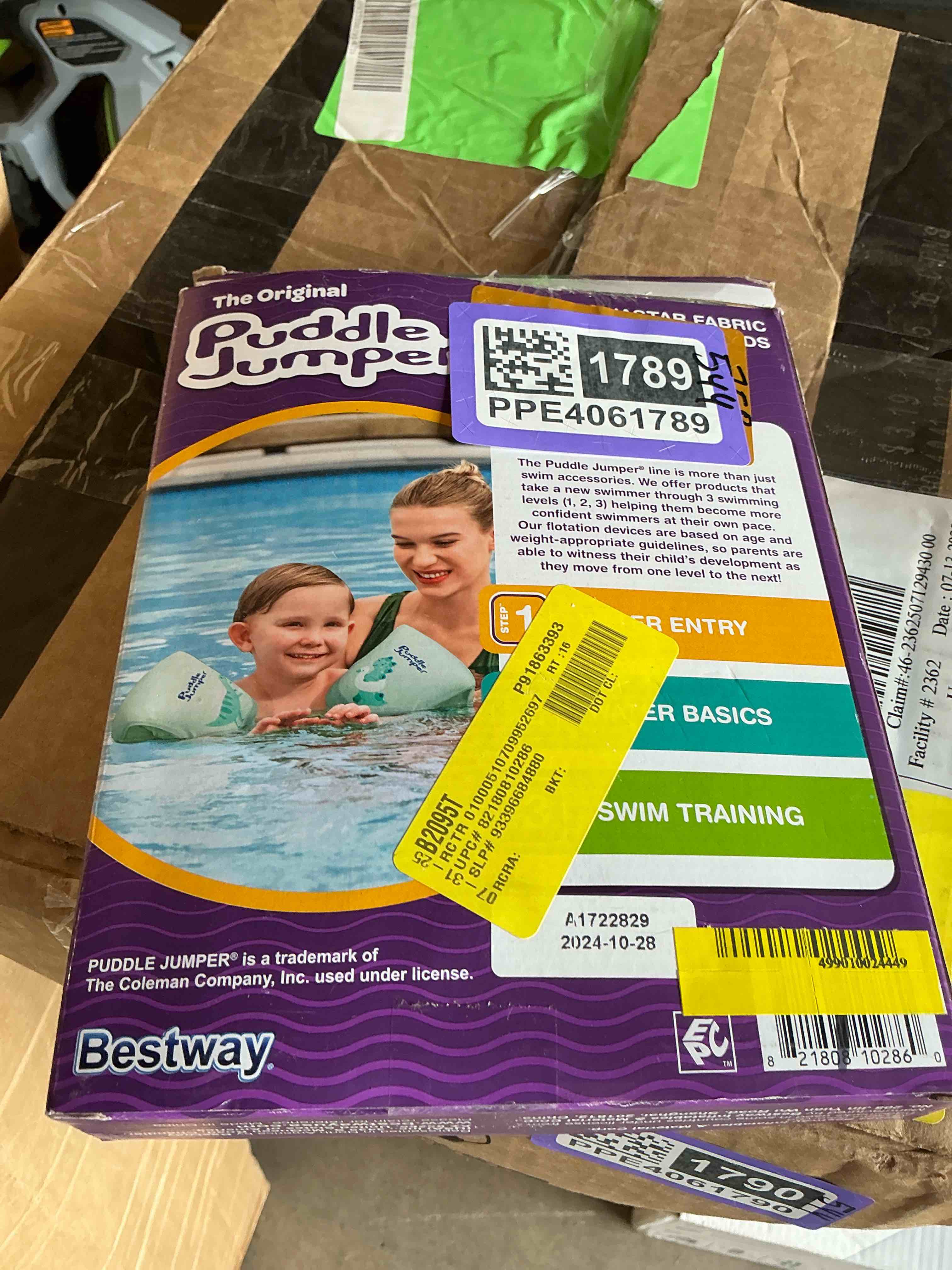 Condition photo showing New/Like New for puddle jumper aquastar fabric inflatable armband floaties, dinosaur, up to 66 lbs