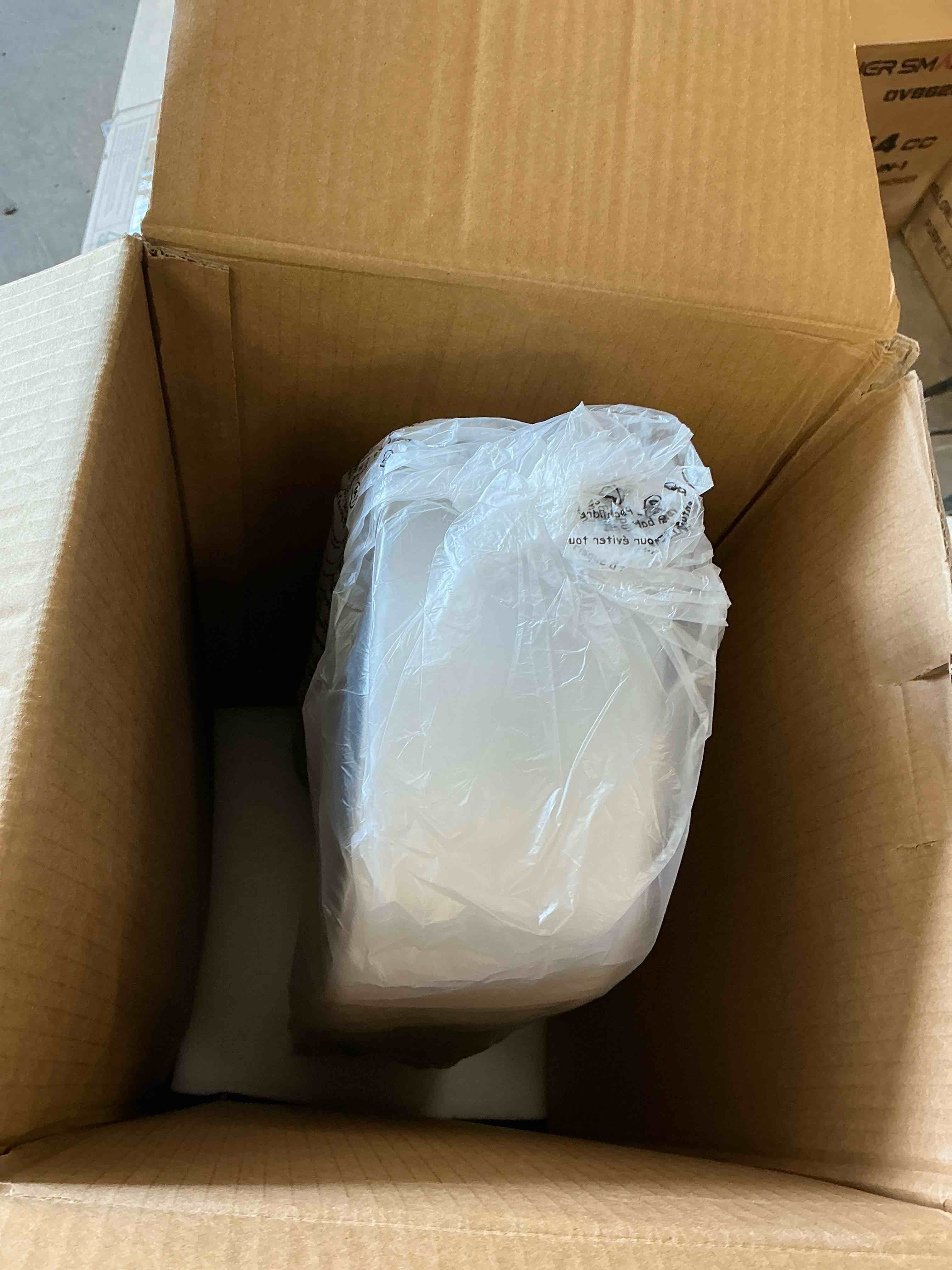 Condition photo showing New/Like New for 8.66 in. diameter, 40 in. tall 3 speed bladeless tower fan w/ oscillation, timer, and remote control in white and silver