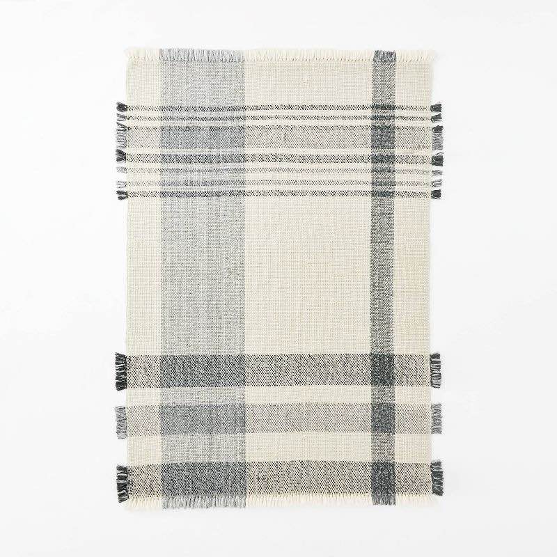 7'x10' Laurelhurst Indoor/Outdoor Plaid Area Rug Black/White - Threshold™ designed with Studio McGee