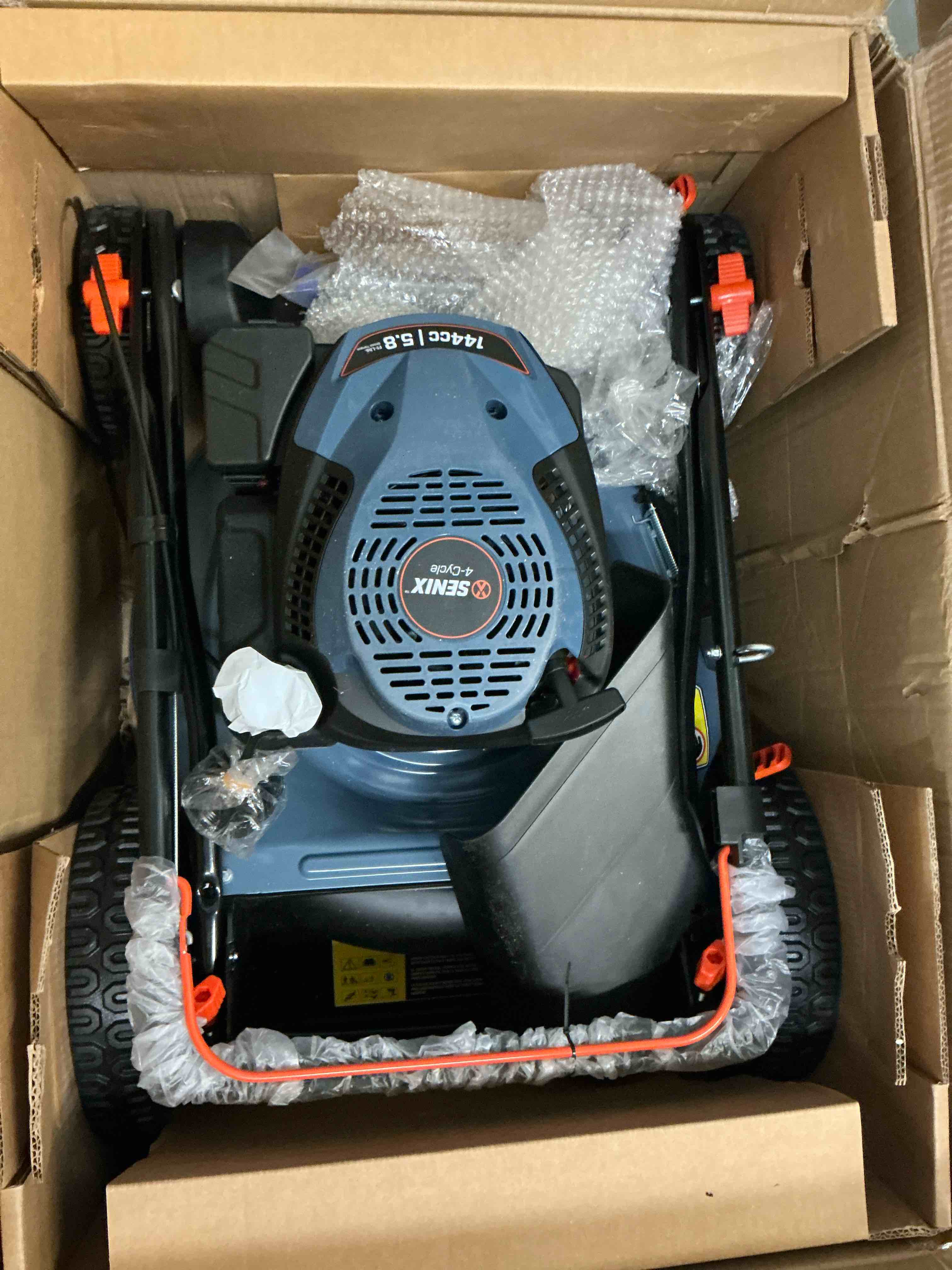 Condition photo showing New/Like New for senix 21" gas lawn mower, 144cc 4-cycle, 2-in-1 mulch & side discharge, durable design, 6 adjustable heights