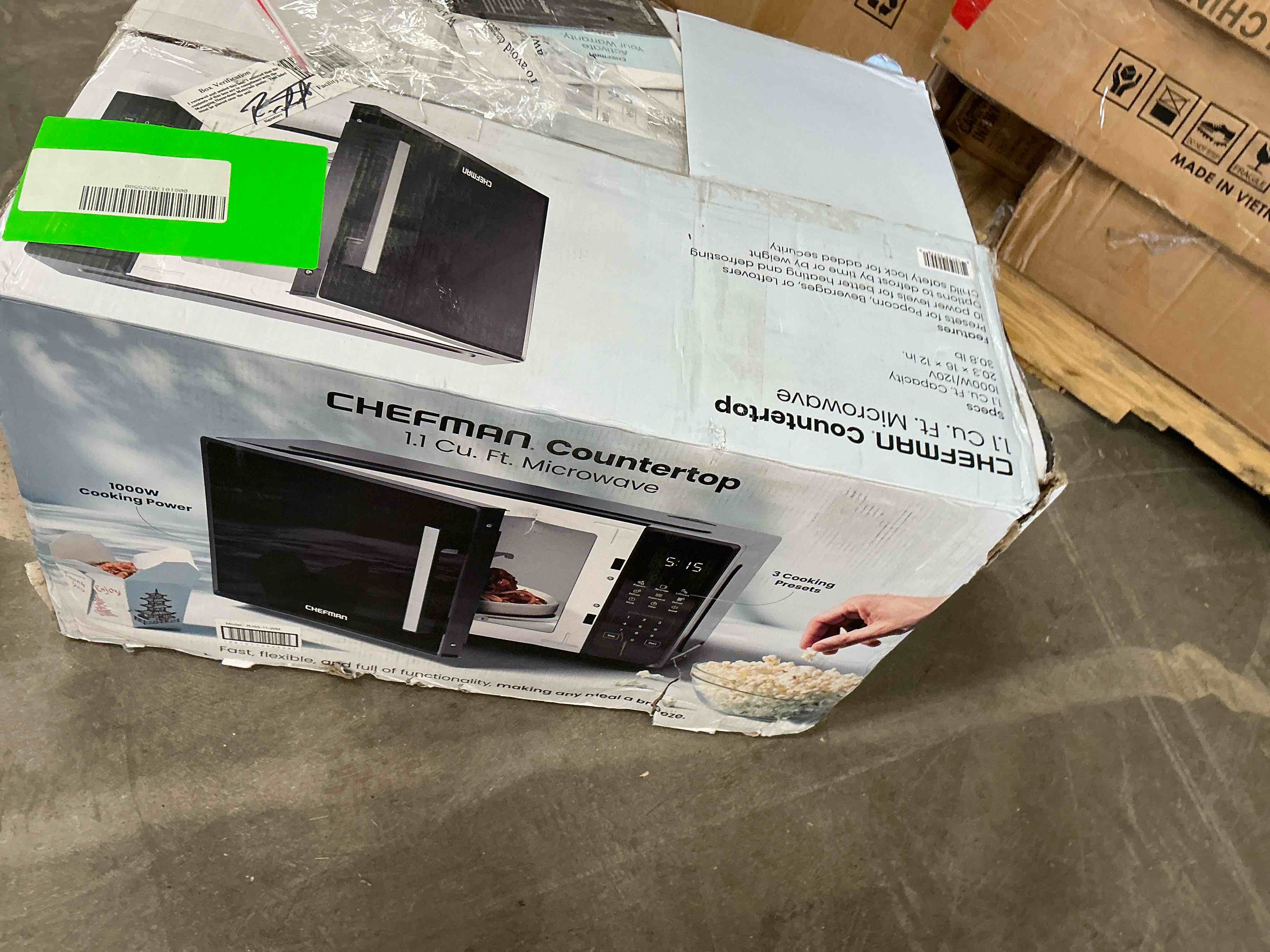 Condition photo showing As Is for chefman countertop microwave oven 1.1 cu. ft.  1000 watts with 3 presets and 10 power levels - black