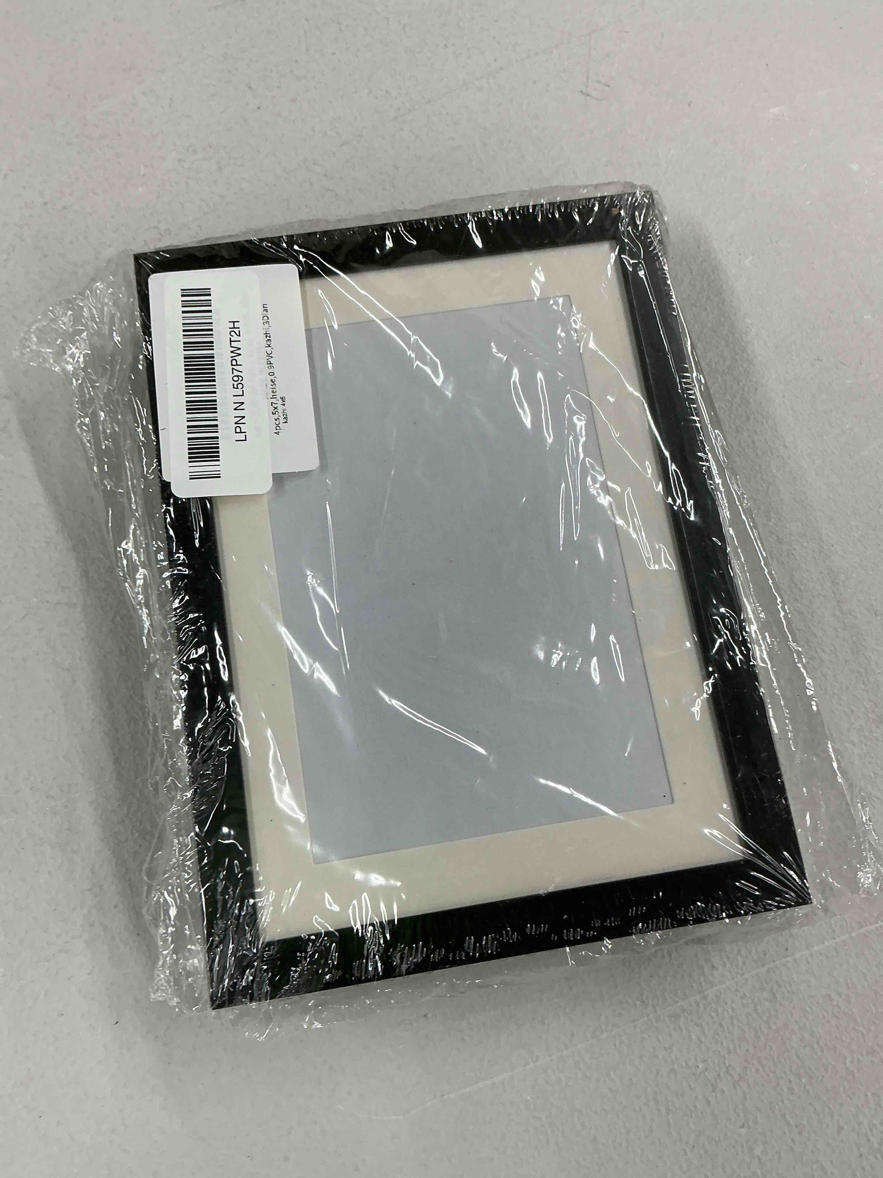 Condition photo showing New/Like New for JCJMY 5x7 Picture Frame with 4x6 Mat Set of 4, Display Photo 4x6 with Mat or 5x7 without Mat, 5 by 7 Wall Poster Photo Frame with Shatter Resistant Plexiglass for Wall or Tabletop, 4 Pack, Black Black 5x7 inch