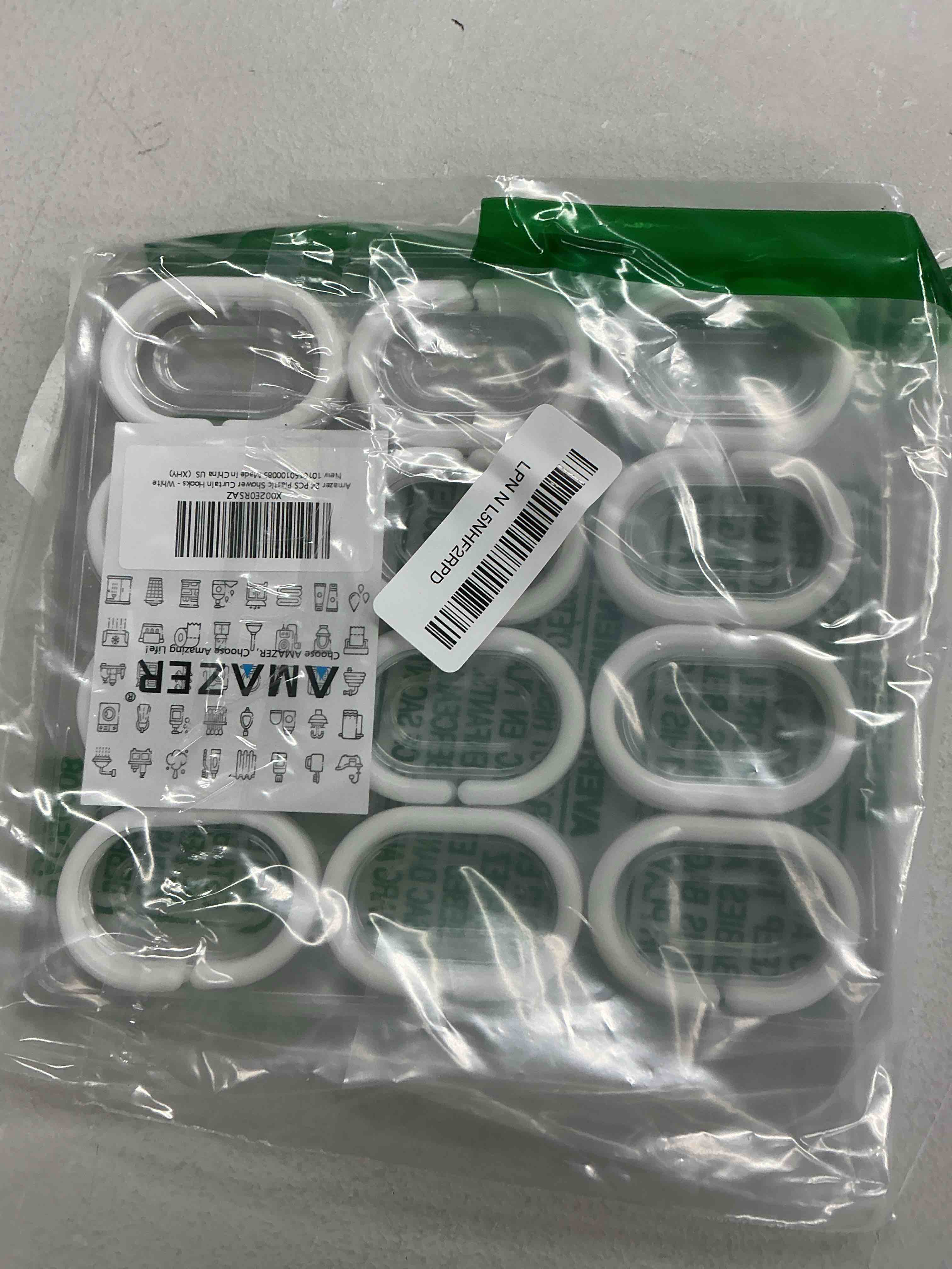 Condition photo showing New/Like New for Amazer White Shower Curtain Hooks Rings, 24 Pcs Plastic Shower Curtain Rings, Plastic Shower Curtain Hooks for Bathroom Shower Rod, White Shower Hooks Rings Loops for Shower Curtain