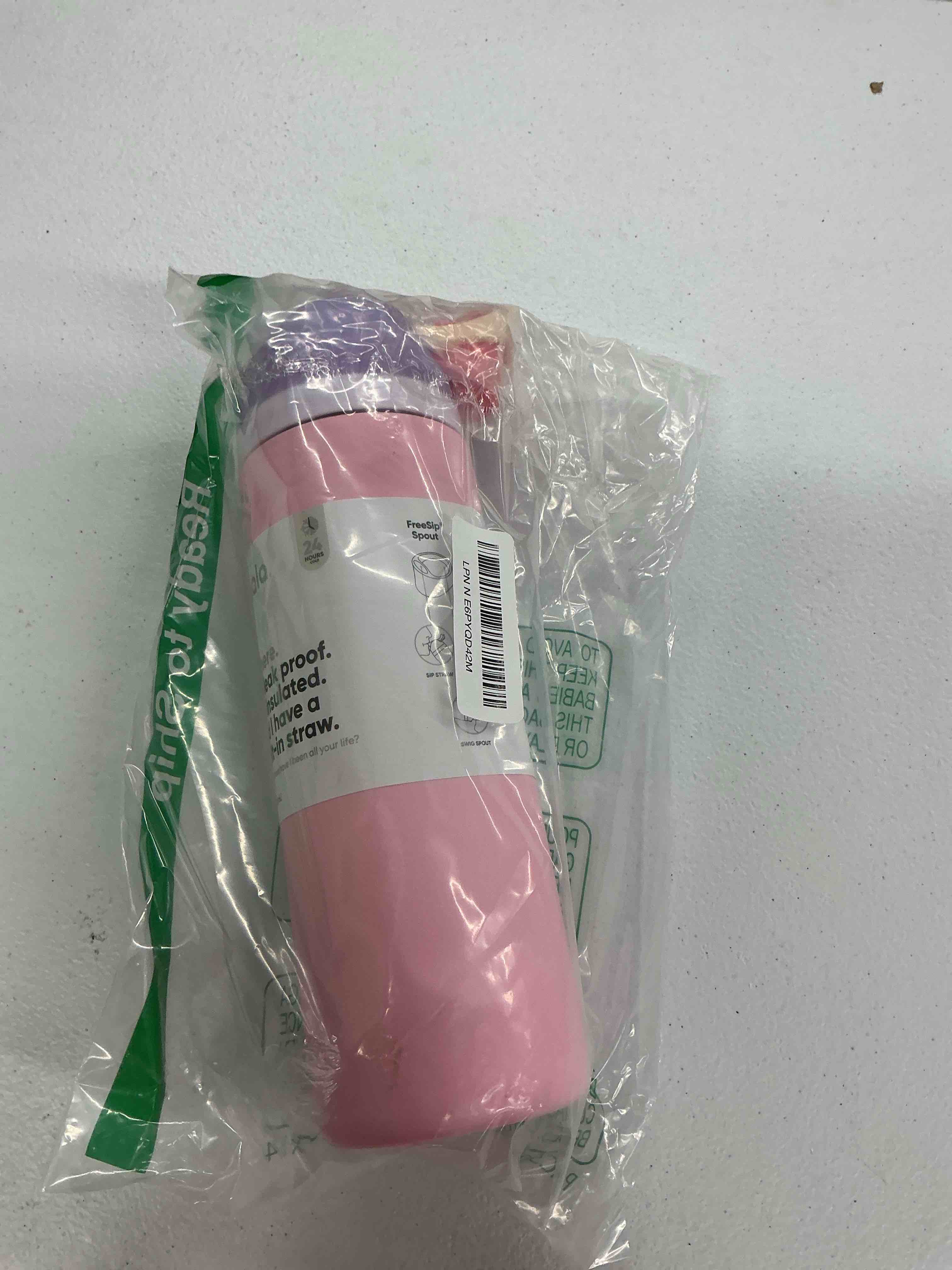 Condition photo showing New/Like New for owala freesip insulated stainless steel water bottle with straw for sports and travel, bpa-free sports water bottle, 24 oz, pink, angel food cake angel food cake 24 ounces
