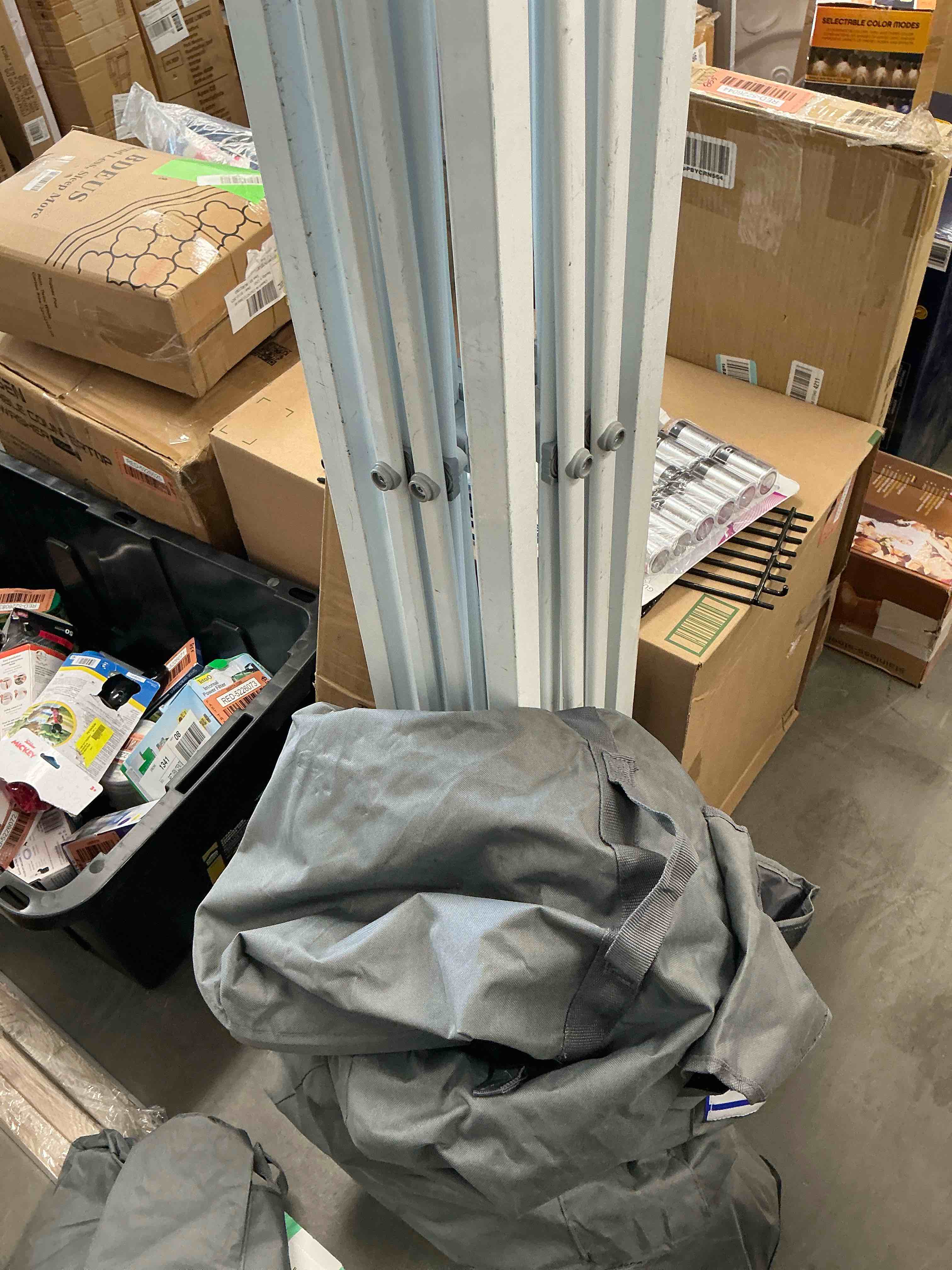 e-z up es100s instant commercial pop up canopy tent, 10' x 10' with 3 sidewalls, 1 mid-zip sidewall and wide-trax roller bag, white