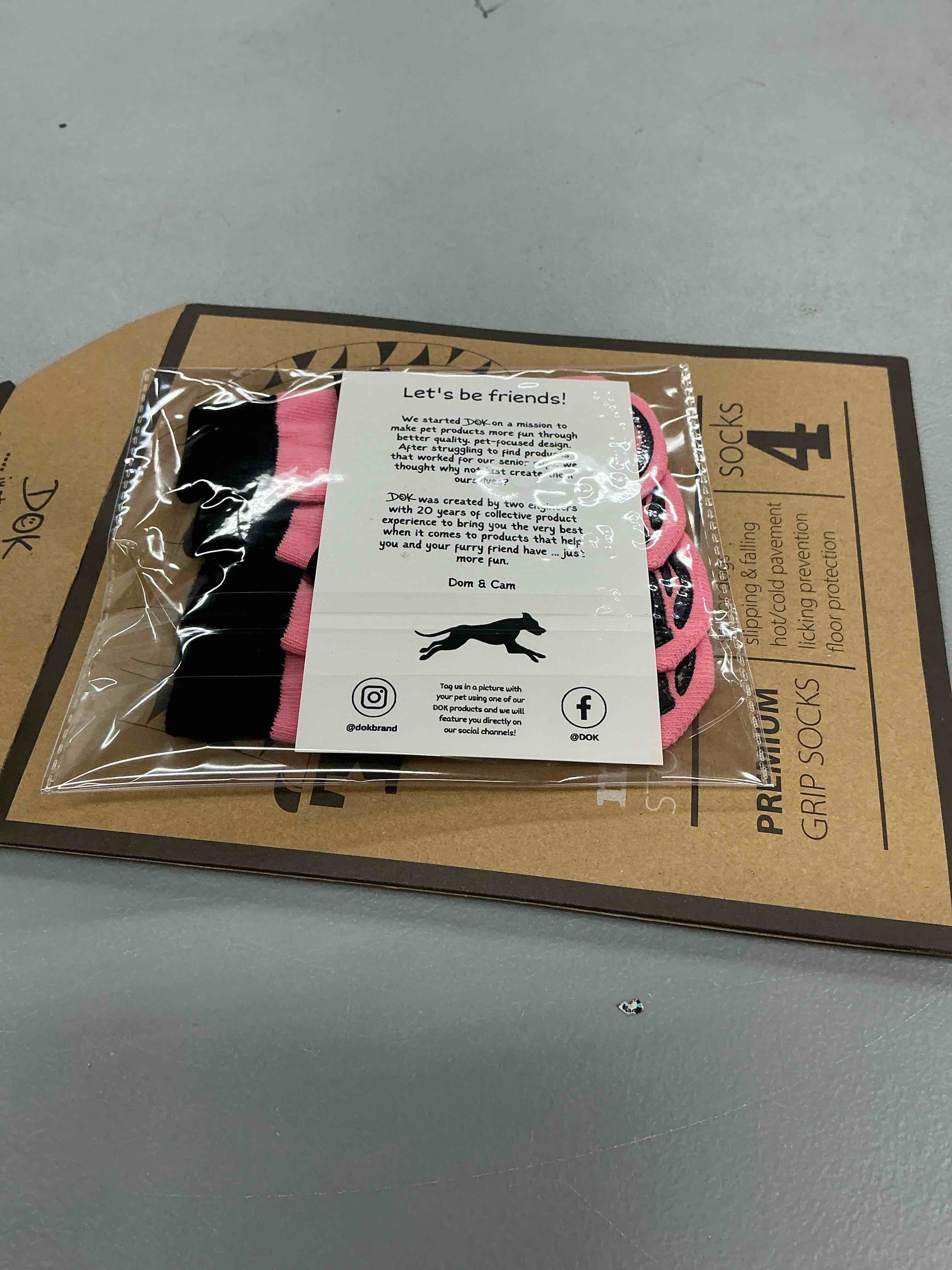 Condition photo showing New/Like New for dok tigertoes premium non-slip dog socks for hardwood floors - extra-thick grip that works even when twisted - prevents licking, slipping, and great for dog paw protection (sassy pink, medium) sassy pink medium