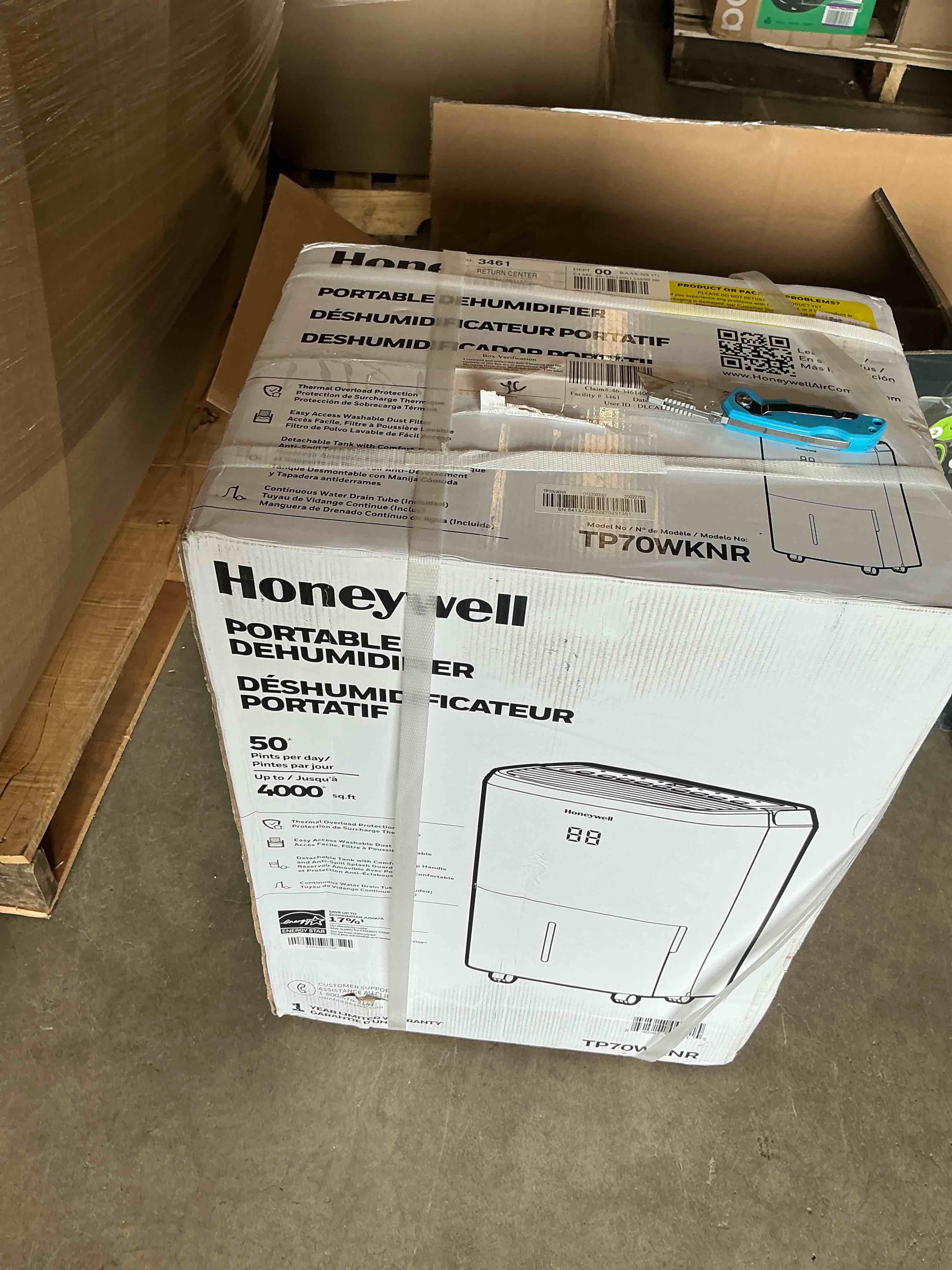 Condition photo showing New/Like New for honeywell - 70 pint dehumidifier - white