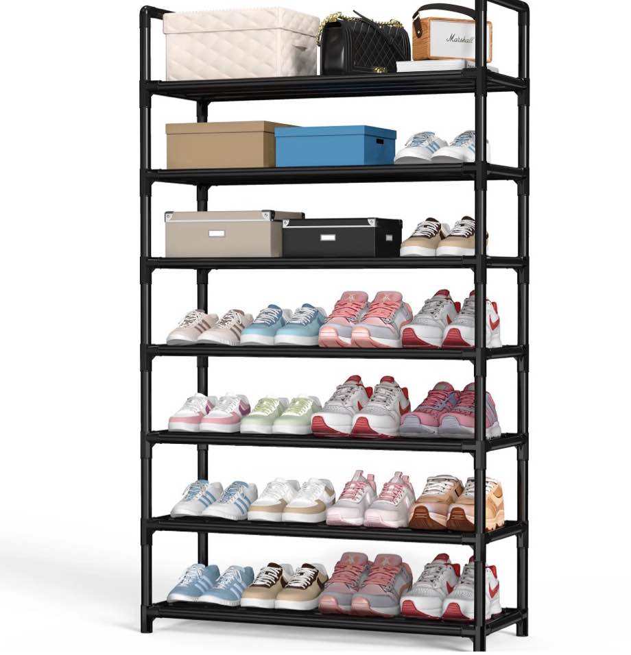 Condition photo showing Good Condition for krpimt 7-tier shoe rack, 31.5" stackable shoe organizer storage holds 21-28 pairs, metal shoe shelf for entryway hallway and closet, black