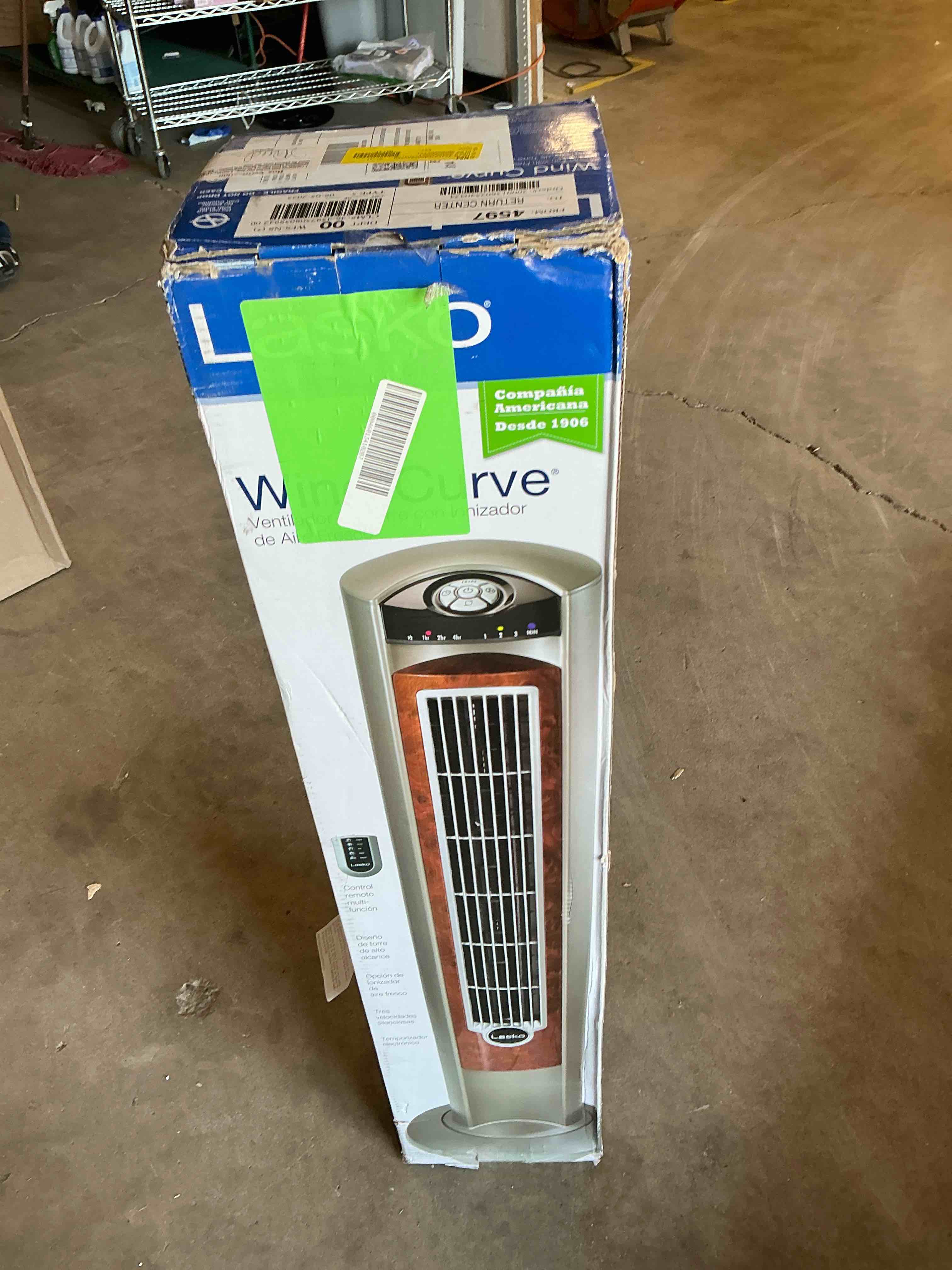 Condition photo showing New/Like New for lasko wind curve 42  3-speed oscillating ionizer remote controlled tower  gray/woodgrain  2554  new
