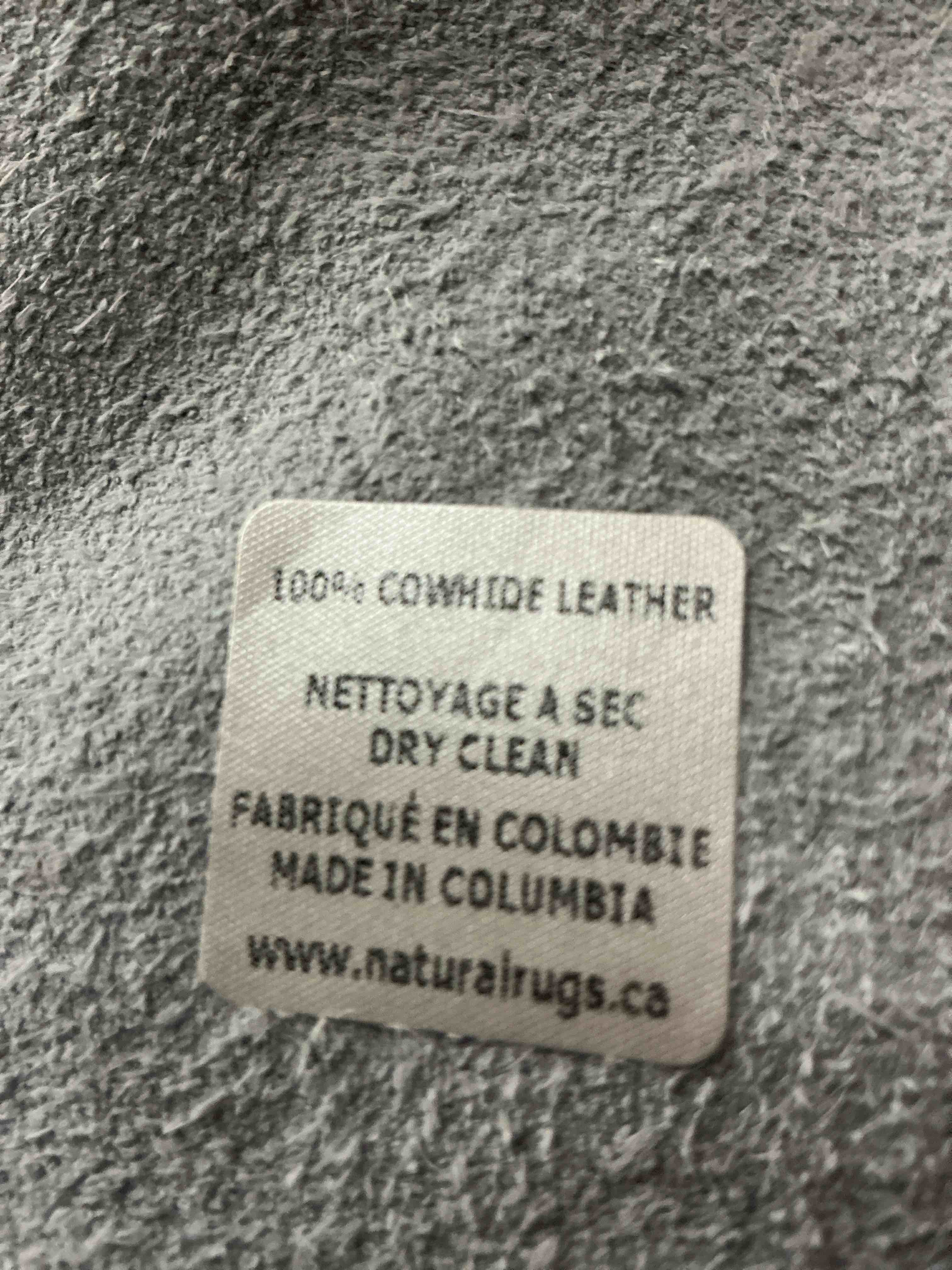 Condition photo showing New/Like New for abhinav performance cowhide animal print indoor rug