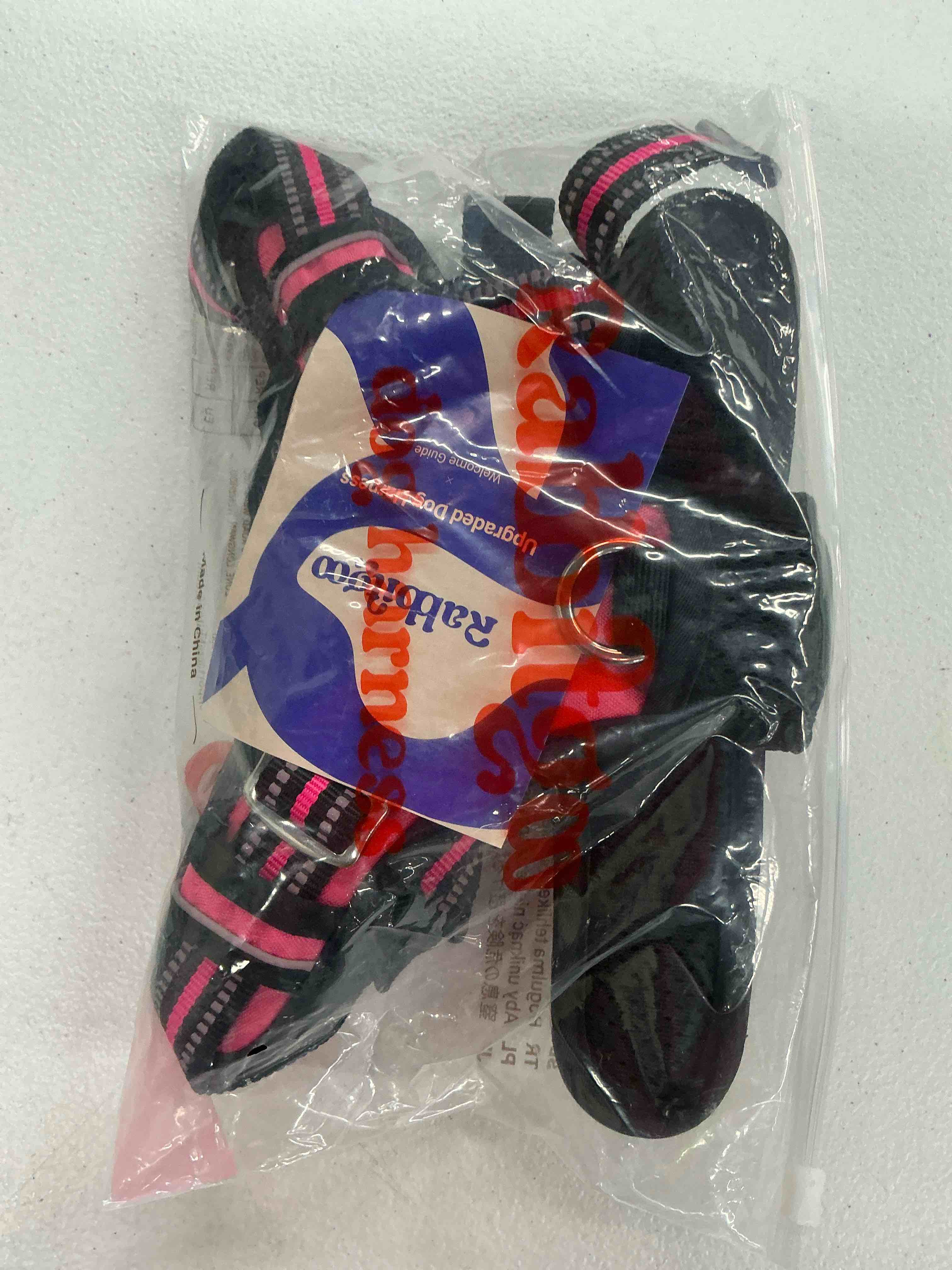 Condition photo showing Good Condition for rabbitgoo dog harness for large dogs, no pull pet vest with 3 buckles, adjustable soft padded pet harness with easy control handle and reflective strips, pink, l large pink