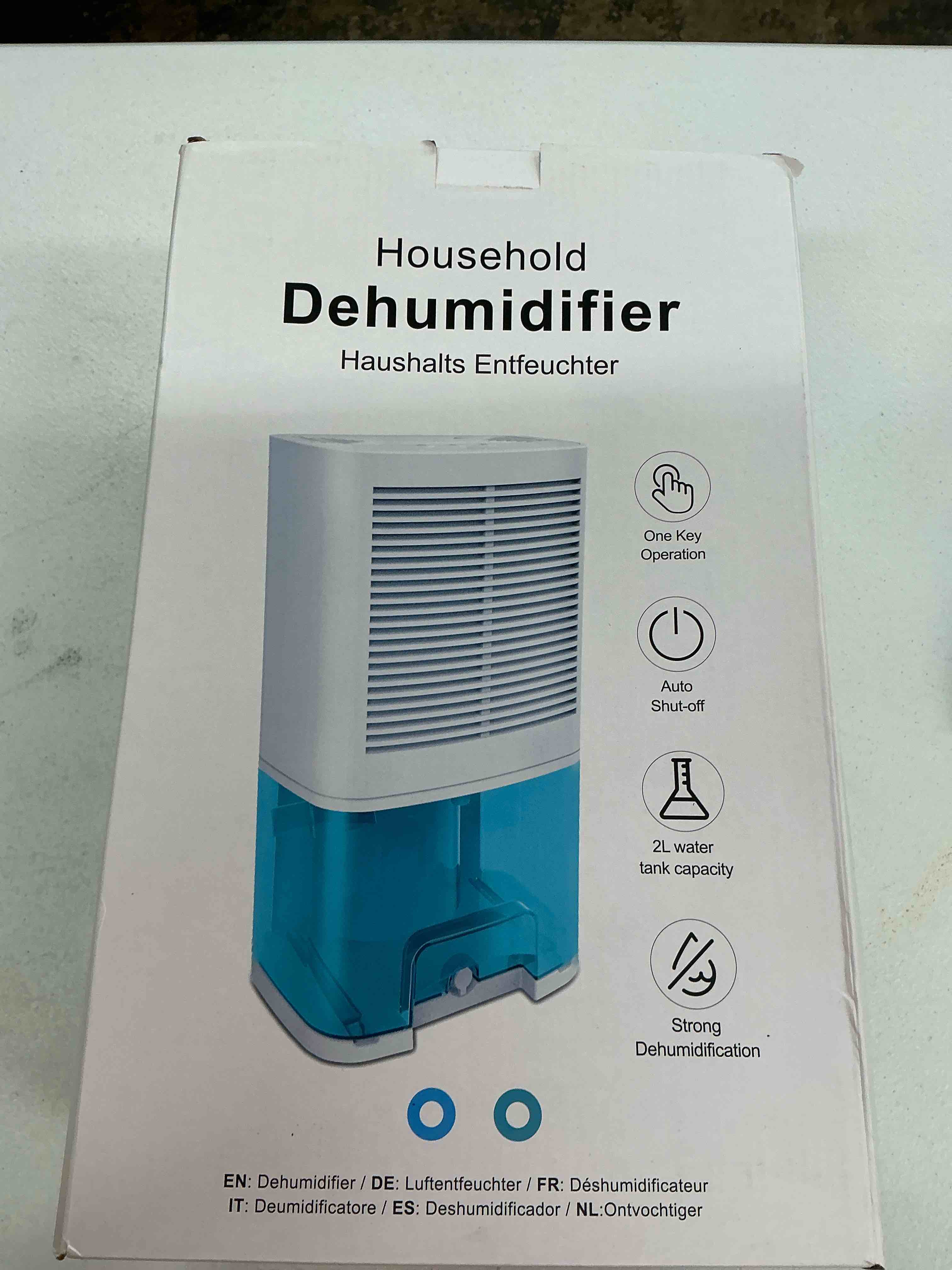 Condition photo showing New/Like New for dehumidifier 68oz(2000ml) small dehumidifier with drain hose for up to 650 sq.ft ultra quiet mini portable air for home basements bathroom bedroom closet kitchen rv 68oz/2000ml