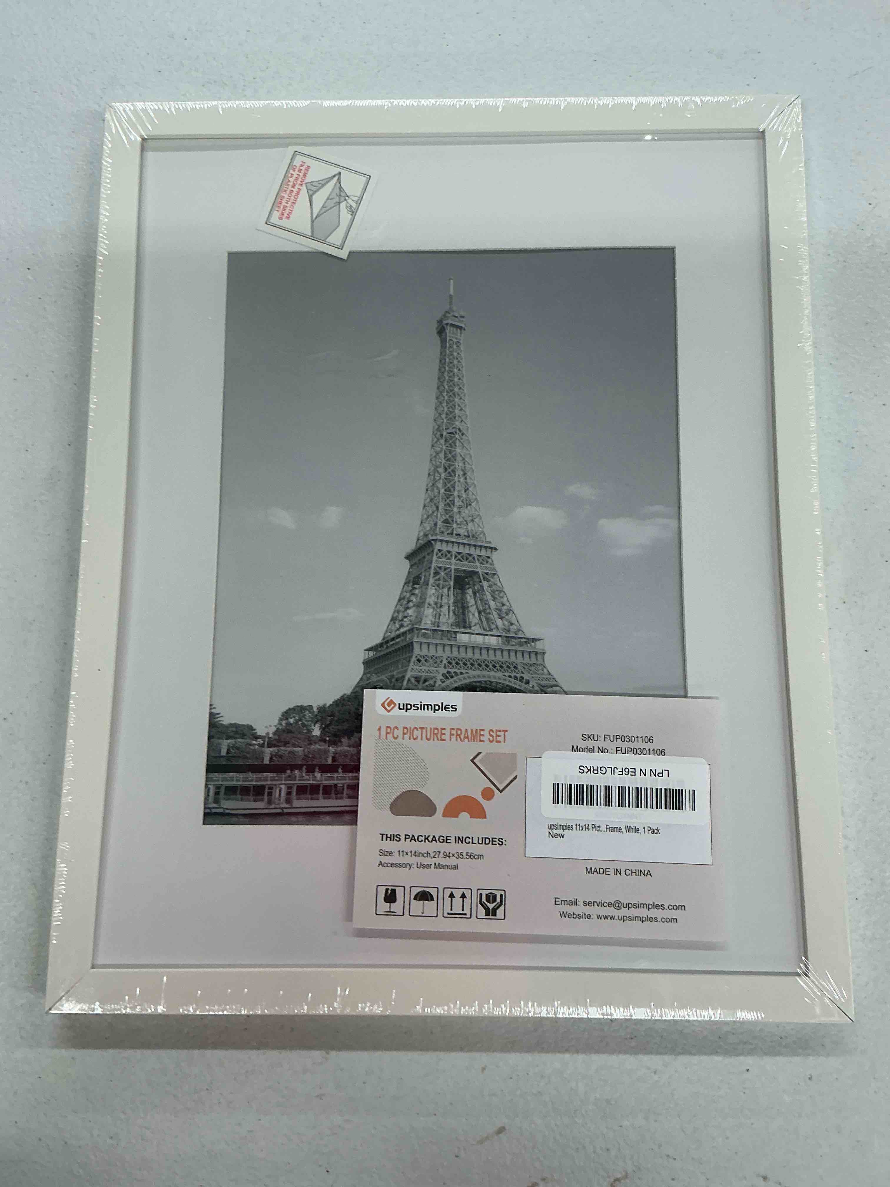 Condition photo showing New/Like New for upsimples 11x14 picture frame, display pictures 8x10 with mat or 11x14 without mat, wall hanging photo frame, white, 1 pack white 11x14
