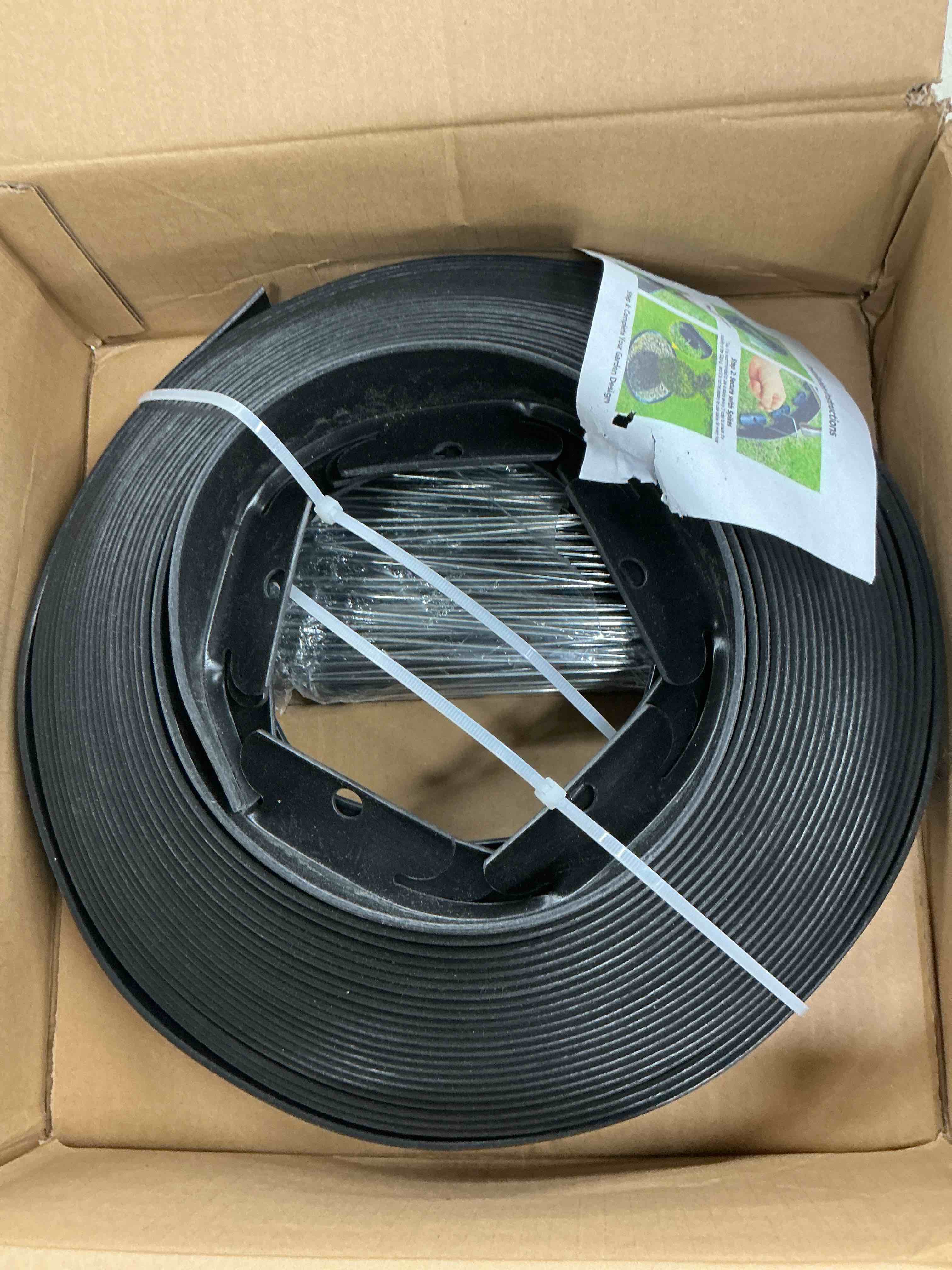 Condition photo showing Good Condition for 1.5 inch x 60 ft (multiple sizes available) landscape edging, garden edging borders with 60pcs upgrade stakes, flexible no dig plastic garden border for lawn, landscaping, flower beds and yard 1.5in x 60ft