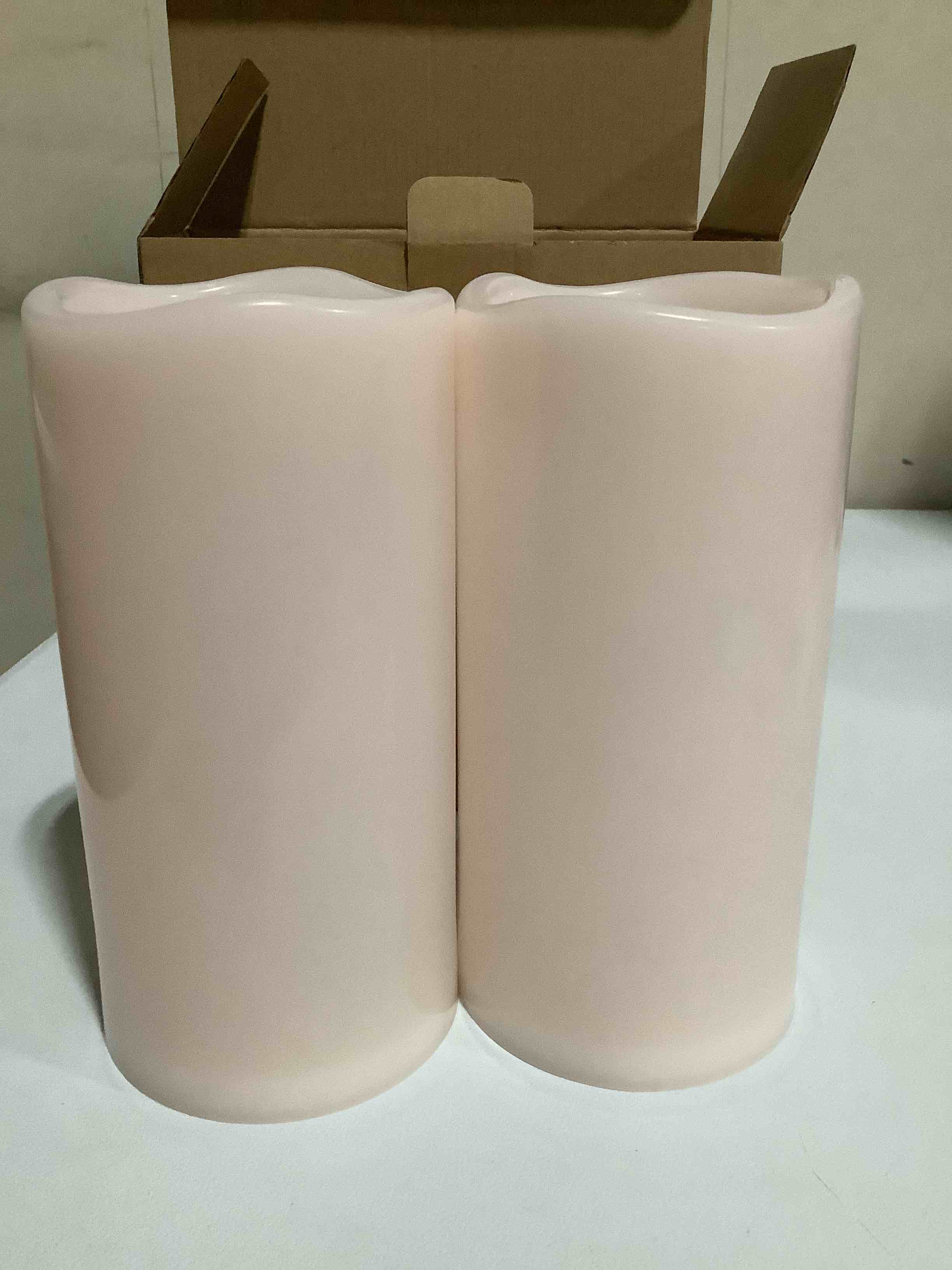 Condition photo showing As Is for NURADA 8" x 4" Large Outdoor Flameless Candles - Waterproof LED Pillar Flickering Candle Battery Operated with Timer Remote Control for Patio Porch Lanterns Decor - Long Lasting Set of 2 Ivory White 4"x 8"
