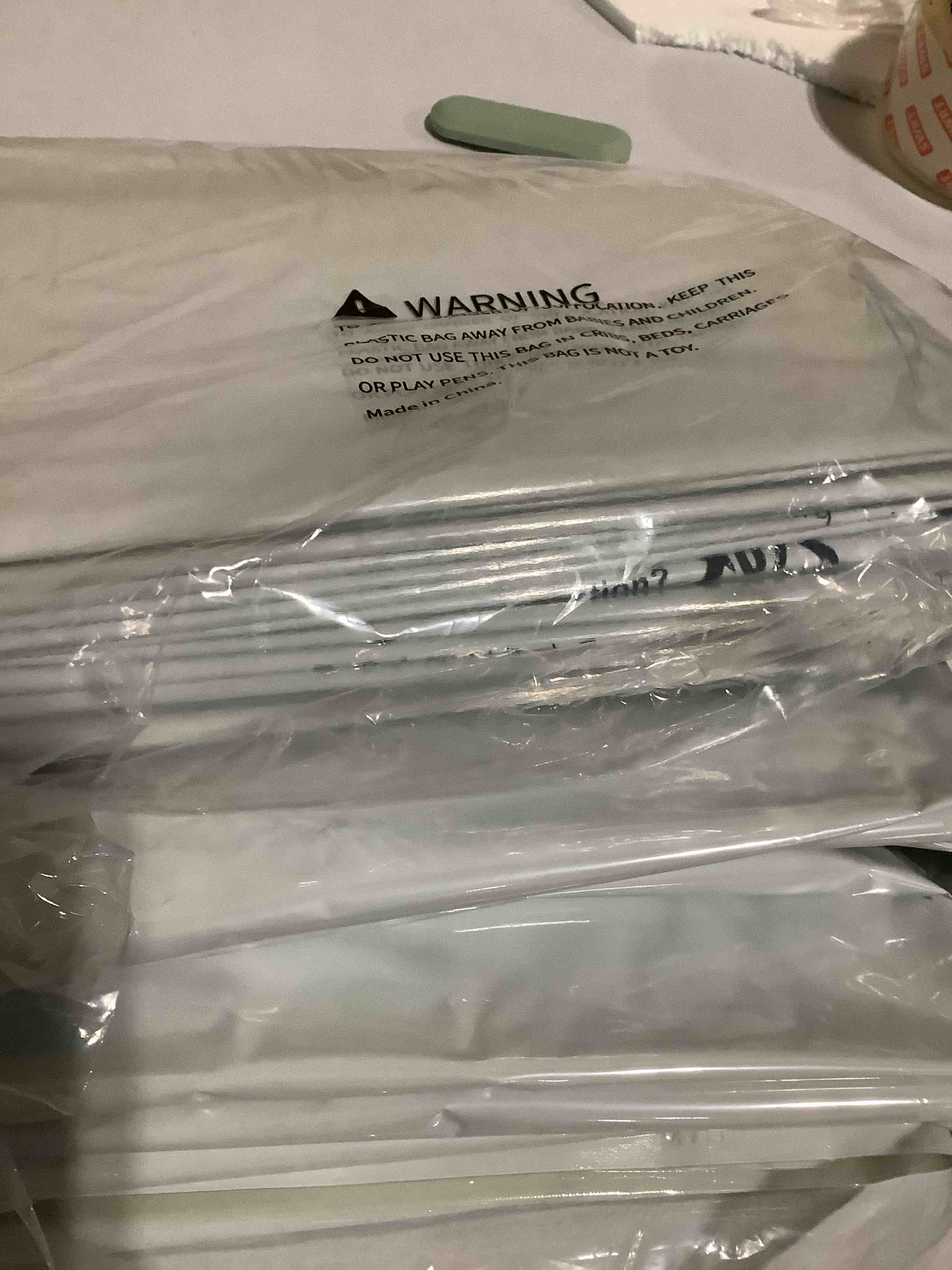 Condition photo showing As Is for TAILI 8 Pack Vacuum Storage Bags for Comforter and Blankets, Jumbo Vacuum Seal Bags for Bedding 40x31 Inch, Space Saver Bags for Clothes, Pillows, Saving More Closet Space 8 Jumbo Cream